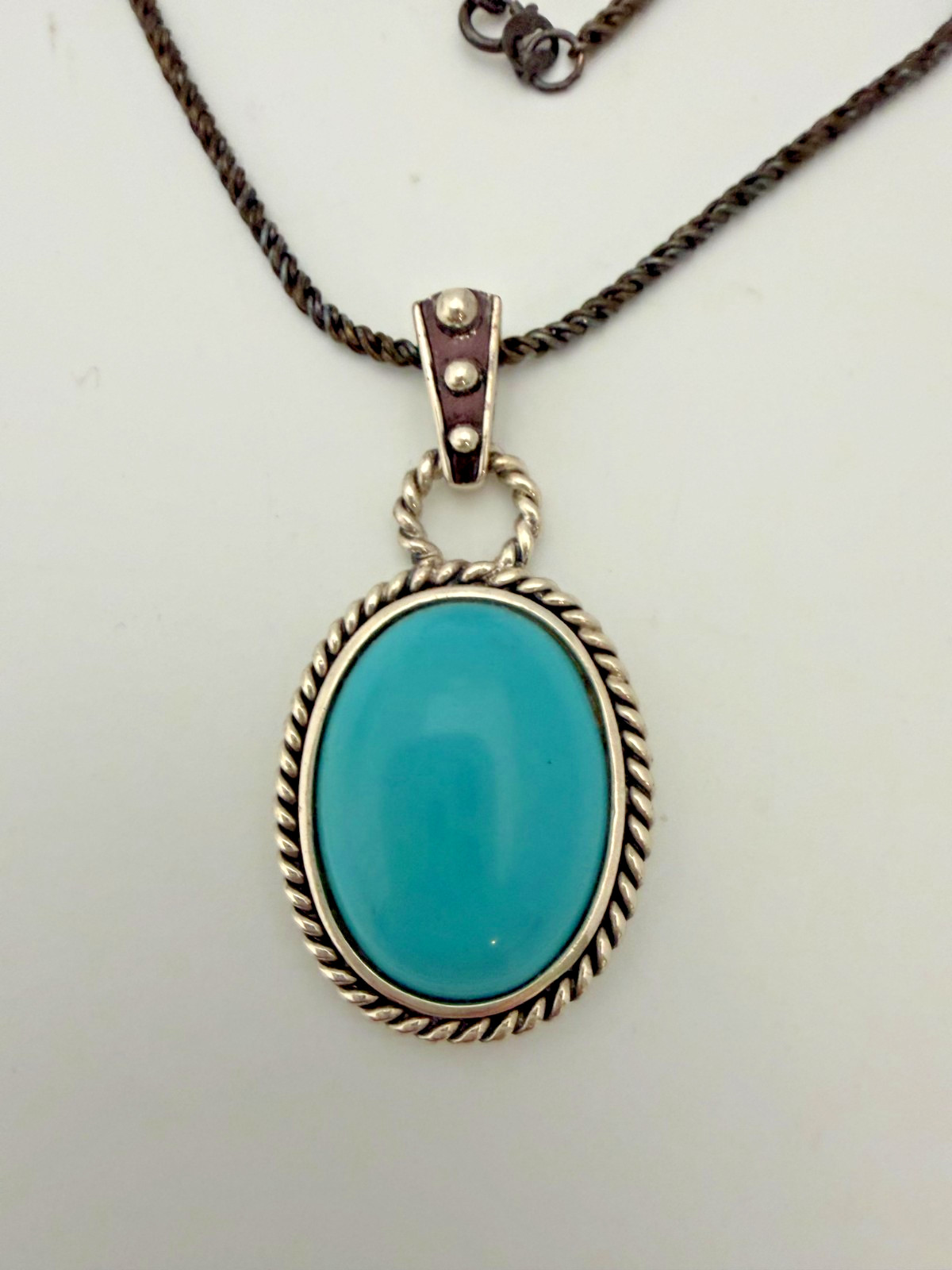 Vintage-style sterling silver “Sleeping Beauty” pendant