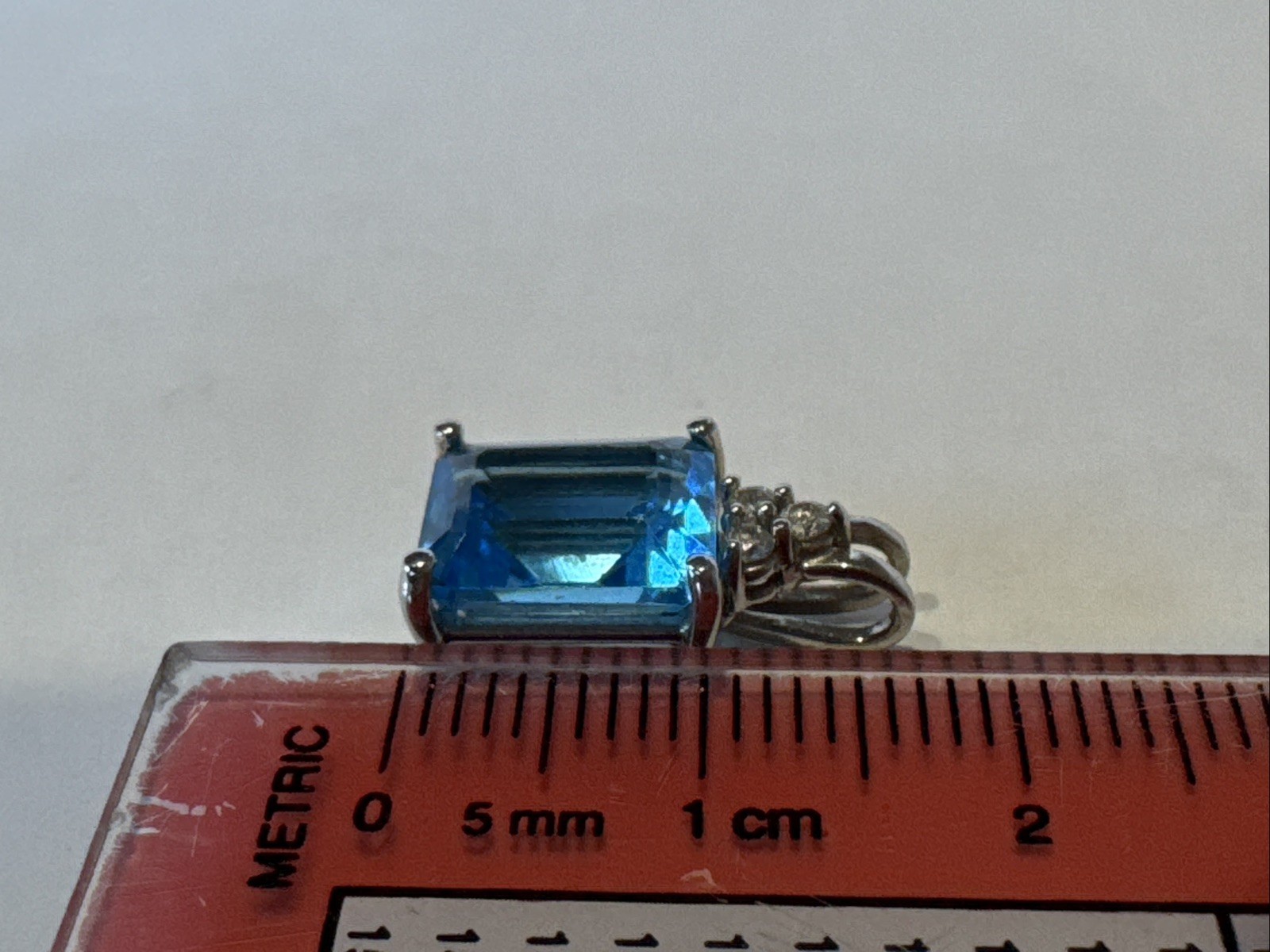 10K White Gold Pendant with Swiss Blue Topaz and White Diamond