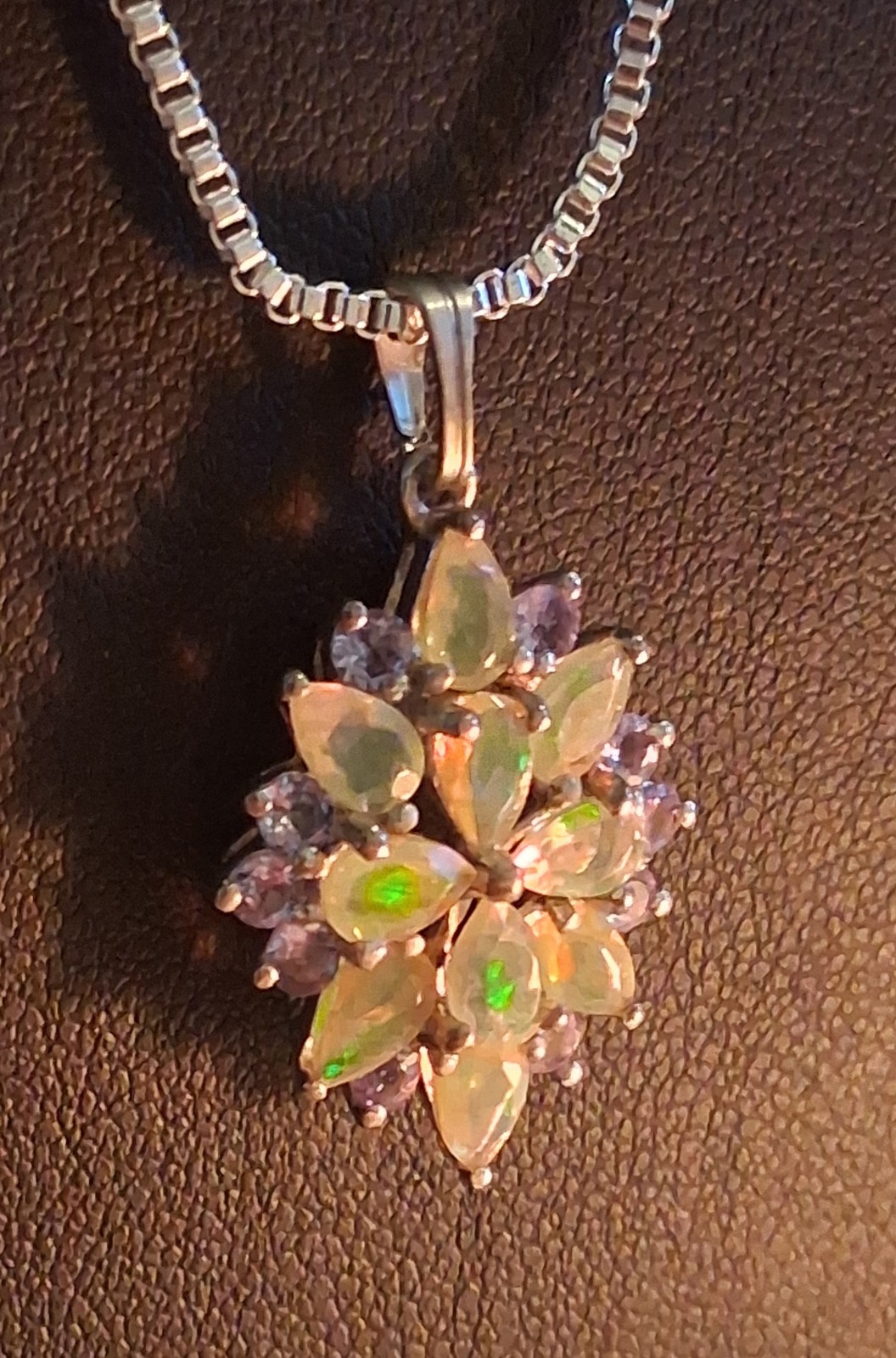 Jtv Ethiopian Opal And Tanzanite Pendant…