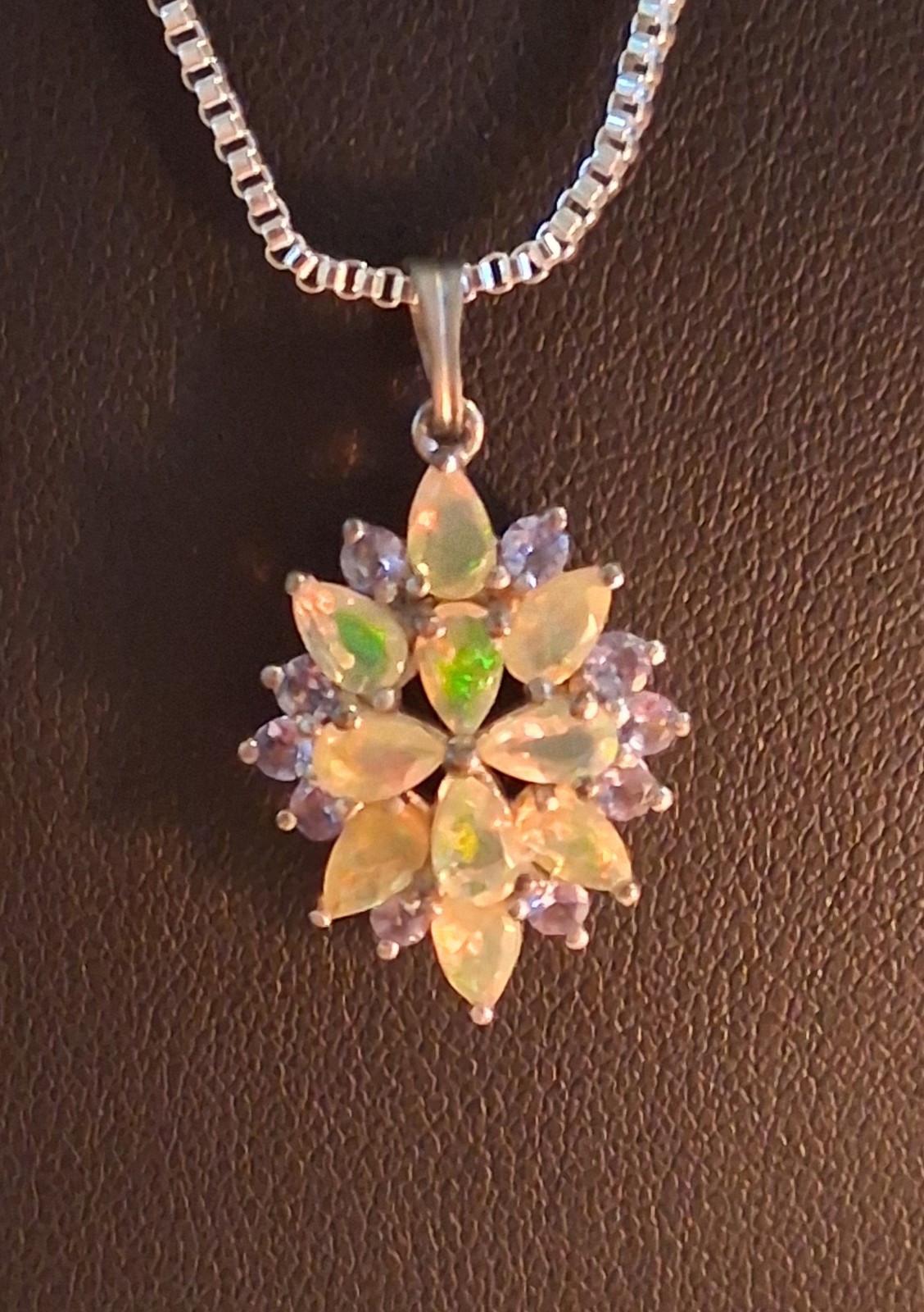 Jtv Ethiopian Opal And Tanzanite Pendant…