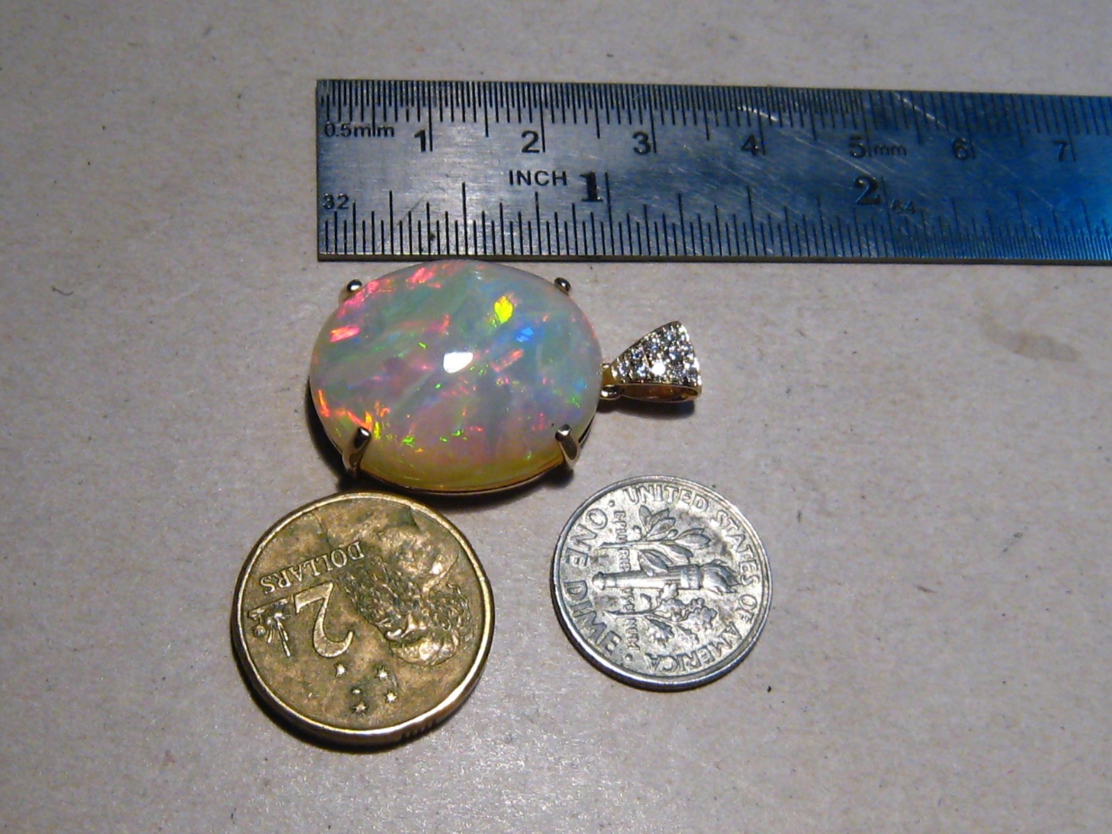 Large 25 ct Welo Opal & Diamond Pendant , Solid 14 k Gold , Brightness 5+