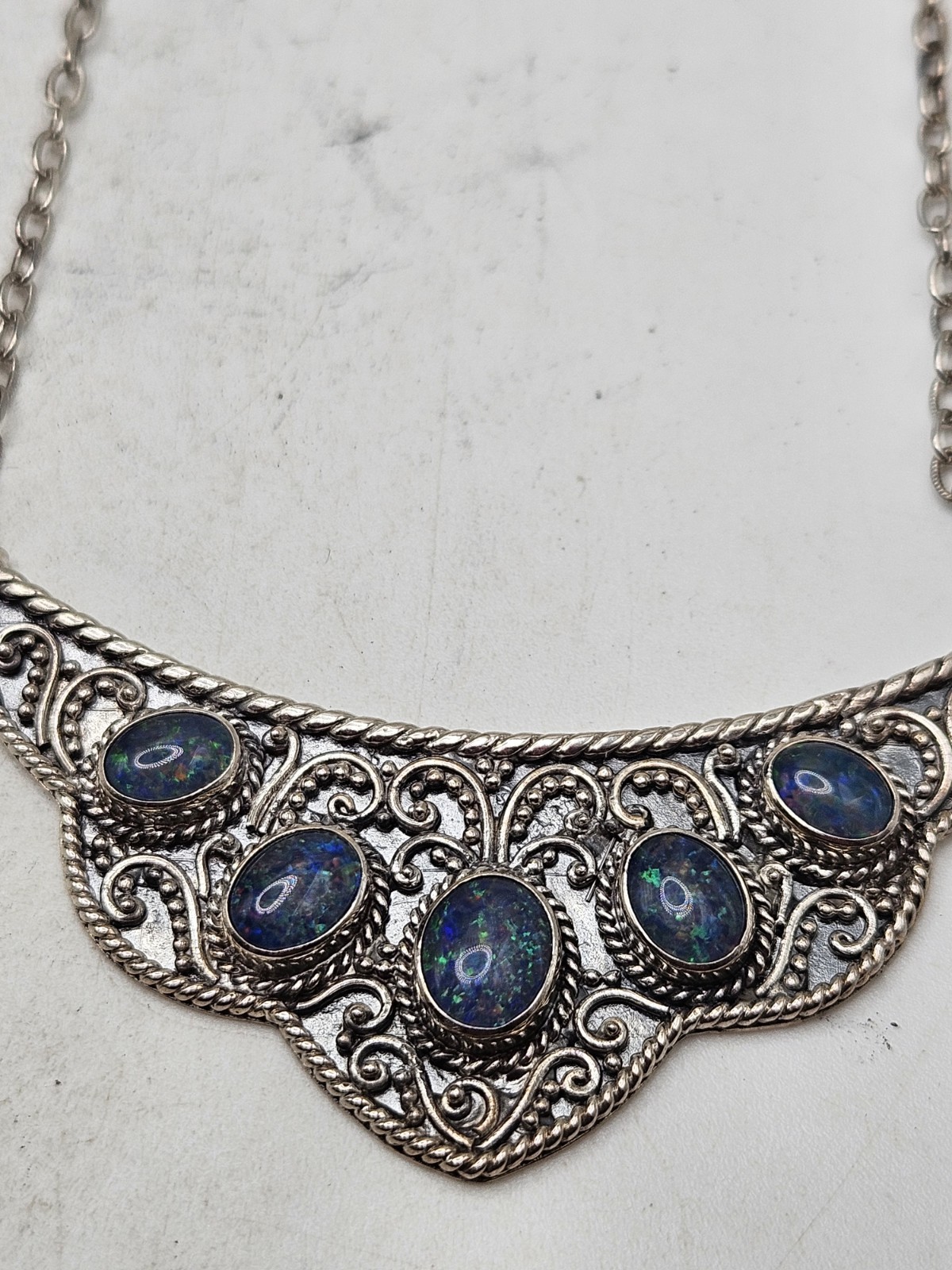 Sterling Silver Bib Style Necklace With 5 Oval Bezel Set Opals. 20″ Marked. 925.