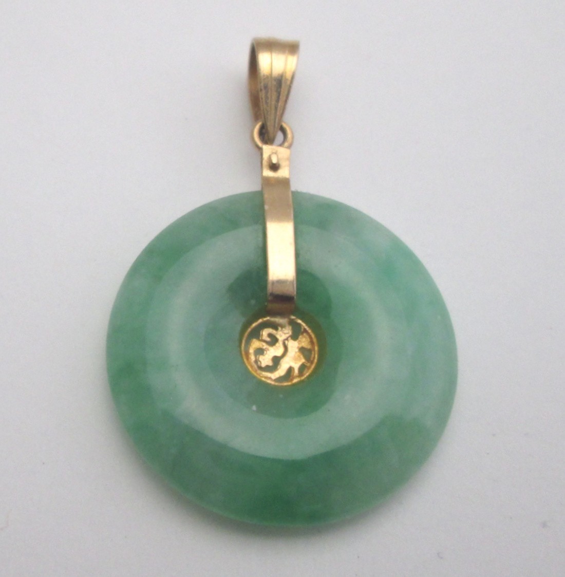 FINE JADEITE DISC PENDANT with 18K YELLOW GOLD, 7.0 score mohs hardness scale