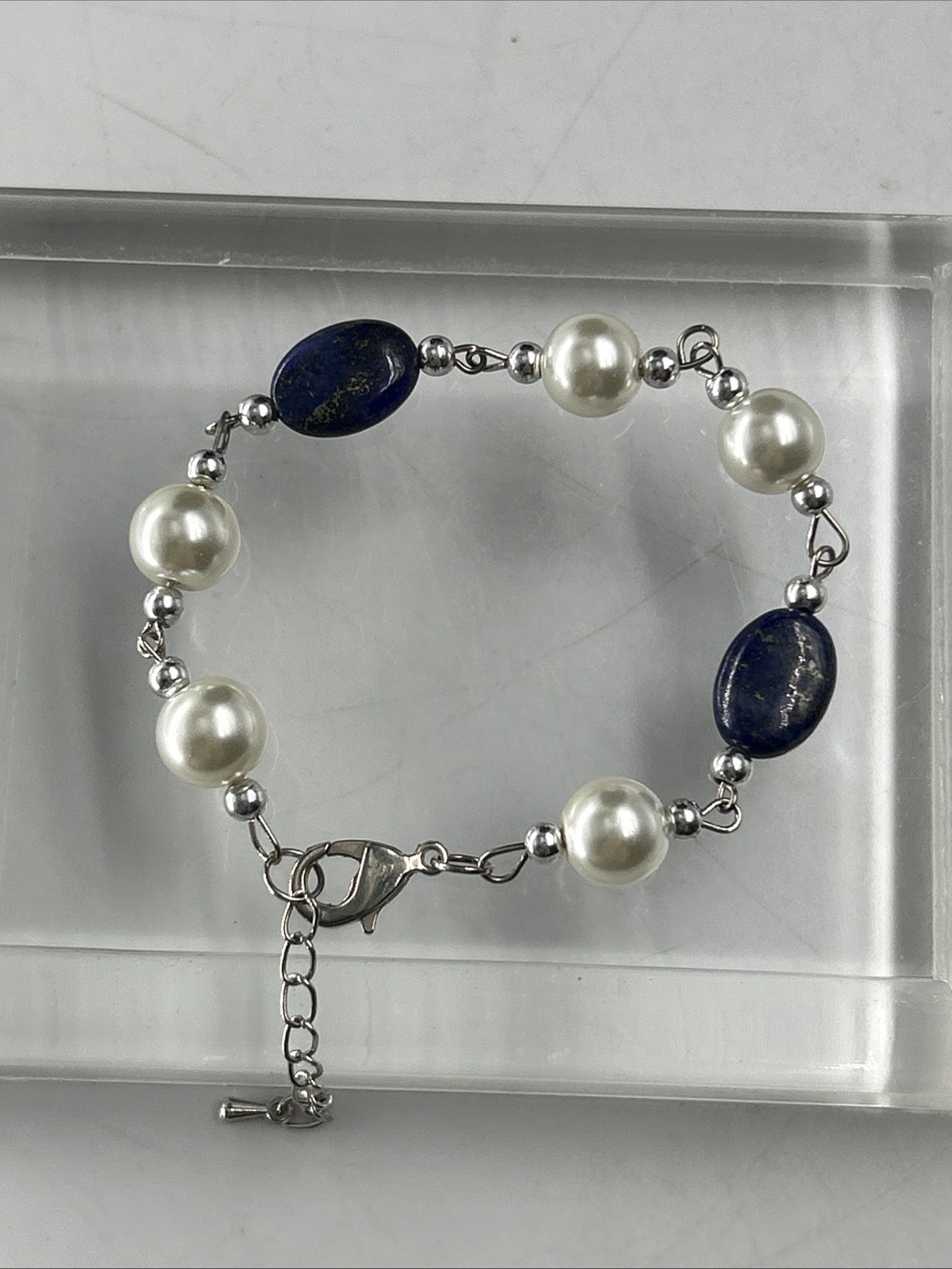 beautiful Fashion necklace with faux pearl and blue stones And Bracelet