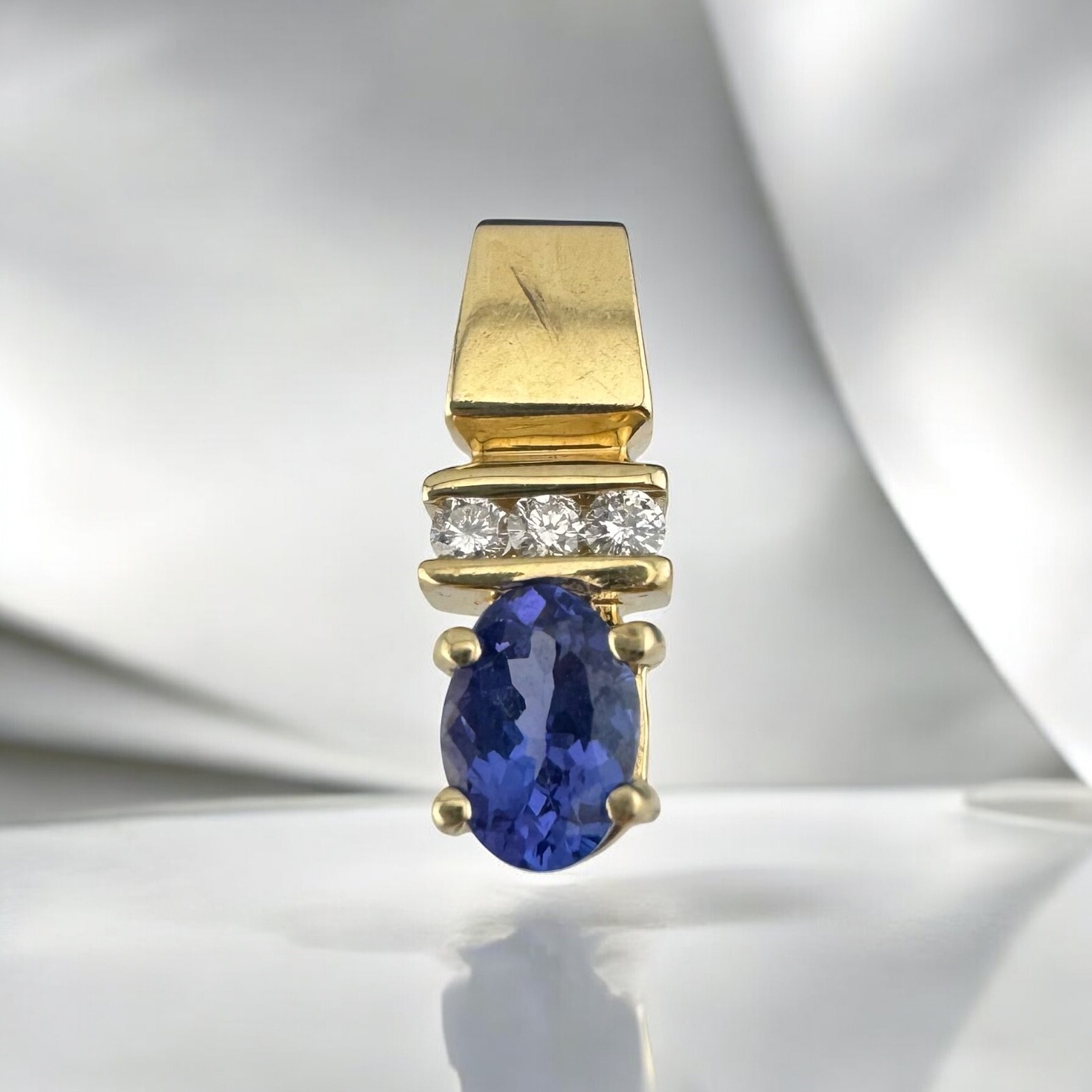 Vintage 14 Karat Gold 0.71 Carat Oval Tanzanite & 0.09 CTW Diamond Slide Pendant