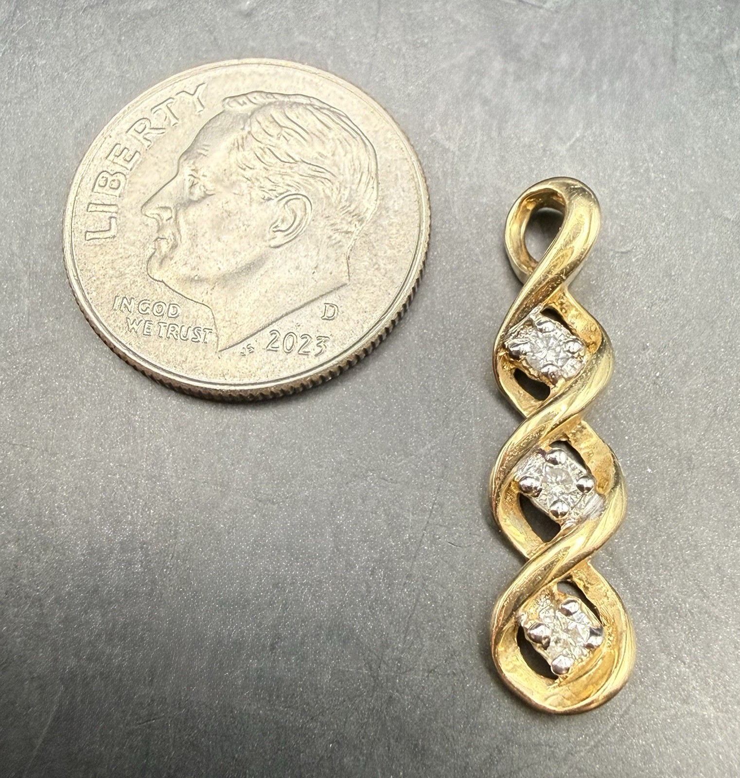 10K Yellow Gold Triple Infinity Pendant/charm featuring 3 genuine diamonds 1.4g