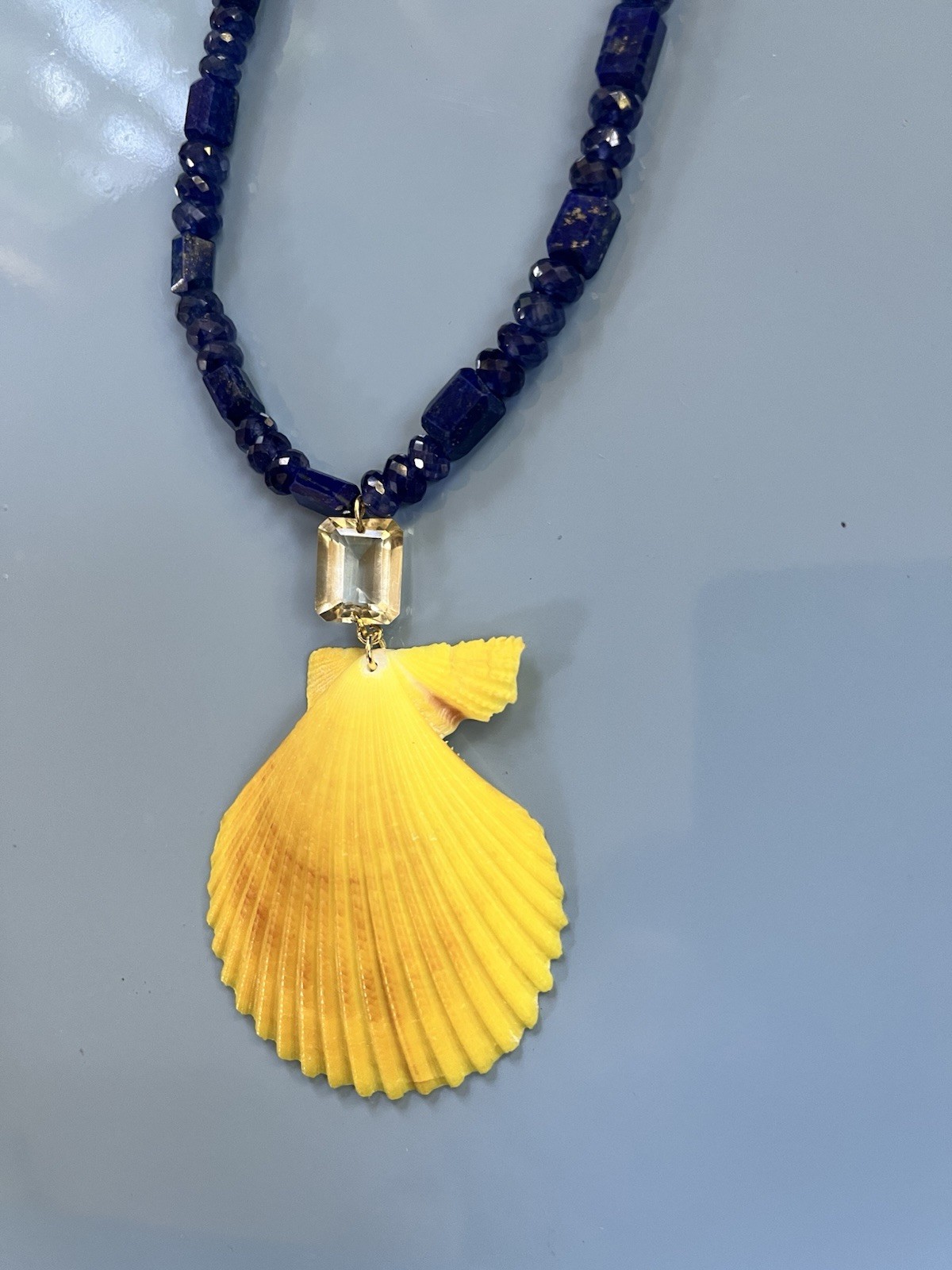 Lapis Kyanite Bead Necklace With Emerald Cut Citrine And Yellow Scallop Shell