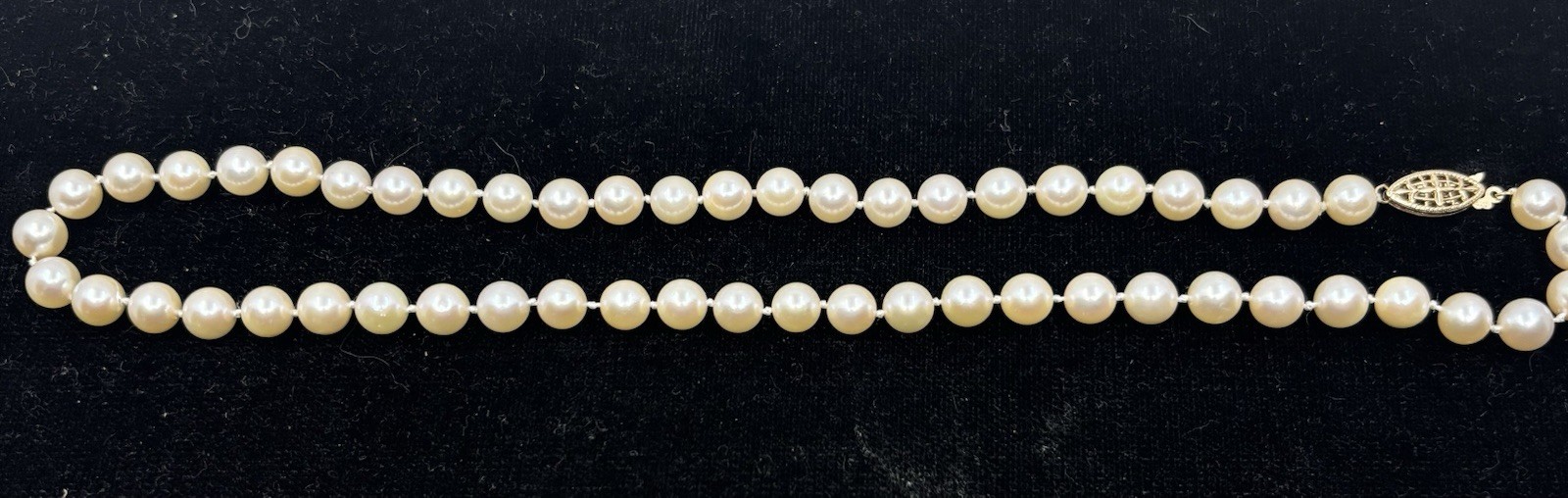 19 Inch Single strand akoya pearl necklace, 7 1/2-7 3/4 mm.