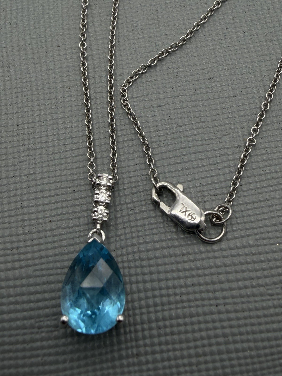 Blue Topaz & Diamond Pendant In 14k White Gold With Chain