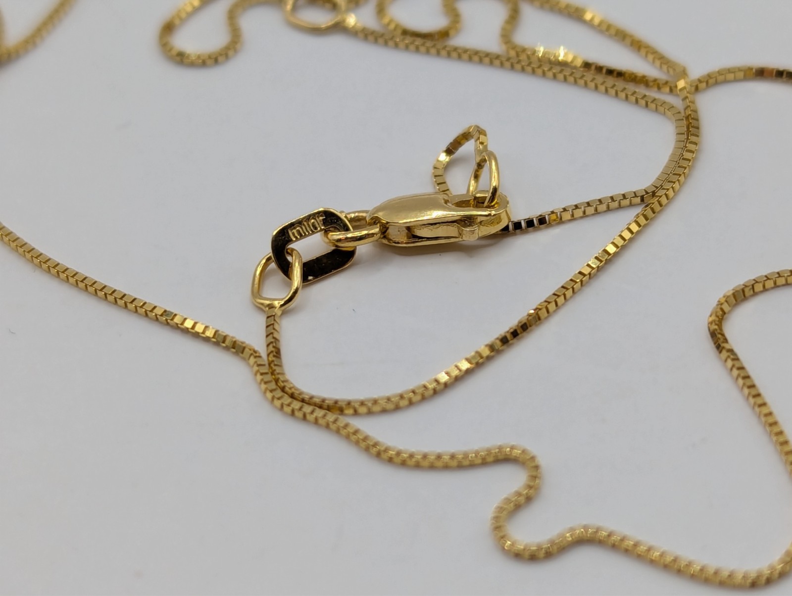 14k Adjustable box chain 16-18″ .6mm with lobster Milor brandclasp