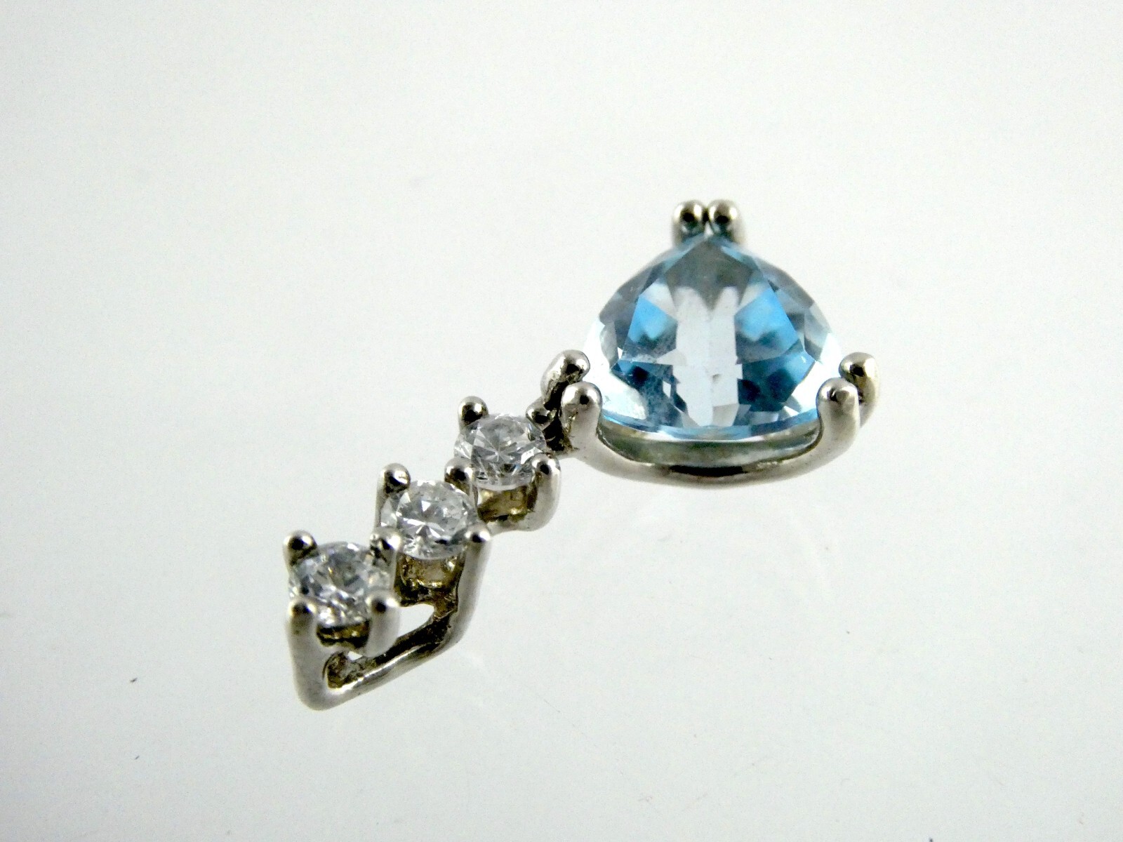 Sterling Silver Blue Topaz White CZ Pendant Trillion and Round Cuts 925 .75 Inch