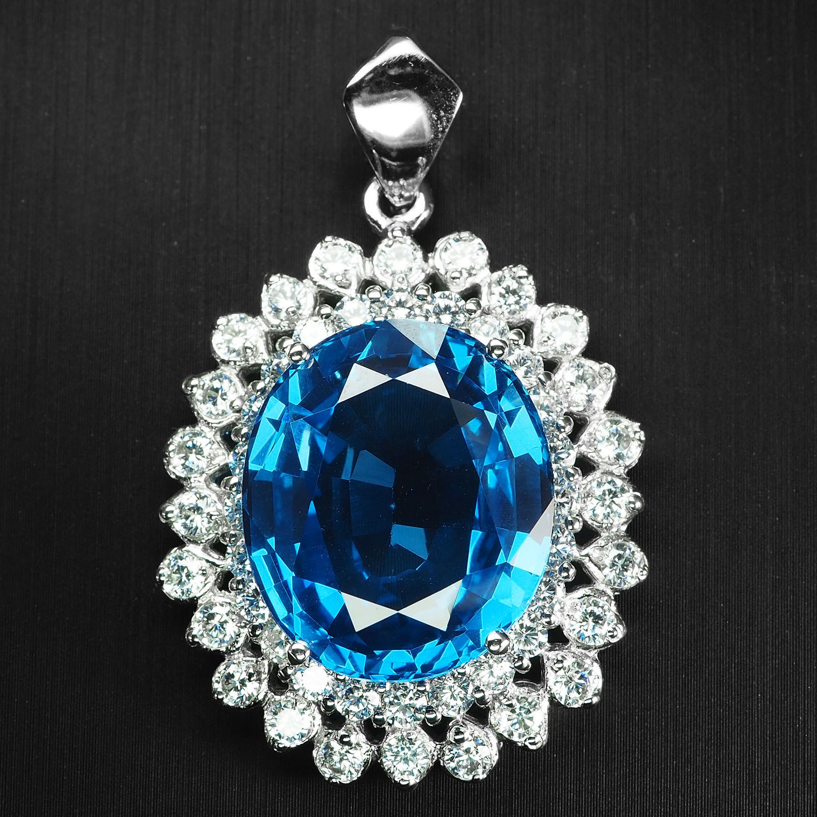 Dazzling Swiss Blue Topaz Oval 26.05Ct 925 Sterling Silver White Gold Pendants