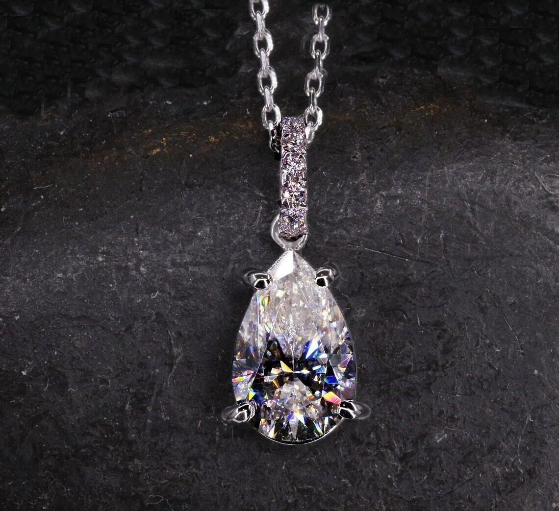 2 Ctw Pear Cut VVS1 Moissanite Solitaire Pendant 14K White Gold Plated 18″ Chain