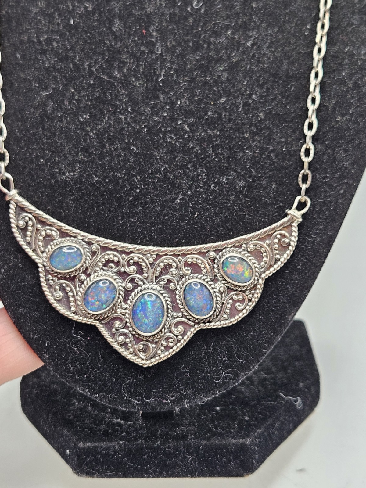 Sterling Silver Bib Style Necklace With 5 Oval Bezel Set Opals. 20″ Marked. 925.
