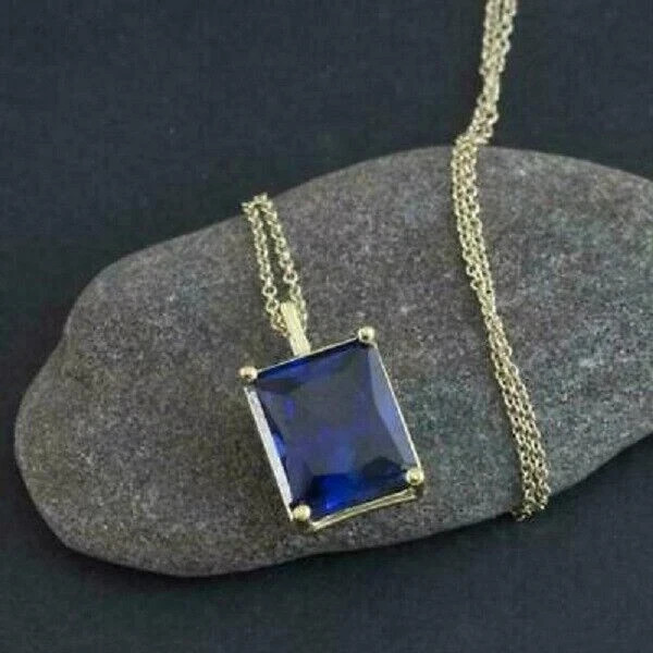 4Ct Emerald Cut Blue Sapphire Solitaire Pendant Free Chain 14K Yellow Gold Over