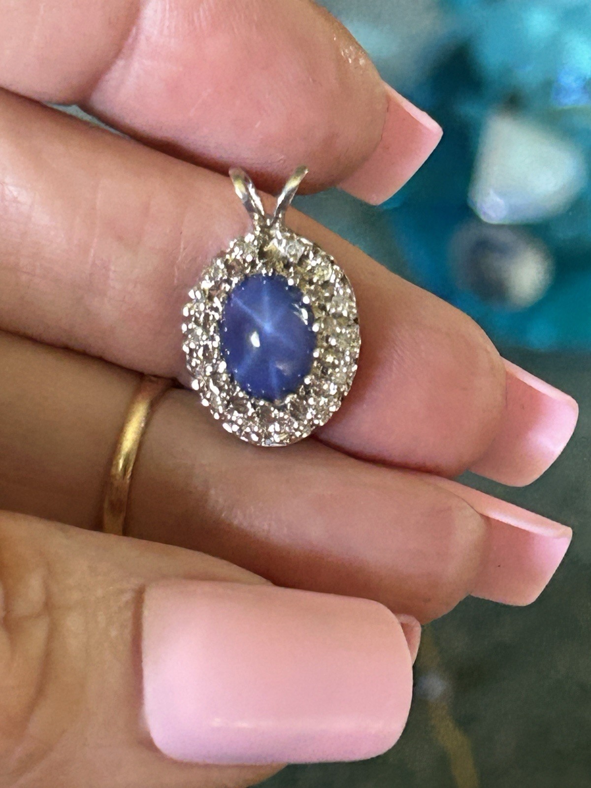 14kt White gold and diamond halo Lindy Star sapphire pendant
