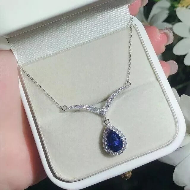 2.2Ct Pear Lab-Created Blue Tanzanite Halo Y-Drop Pendant 14K White Gold Plated