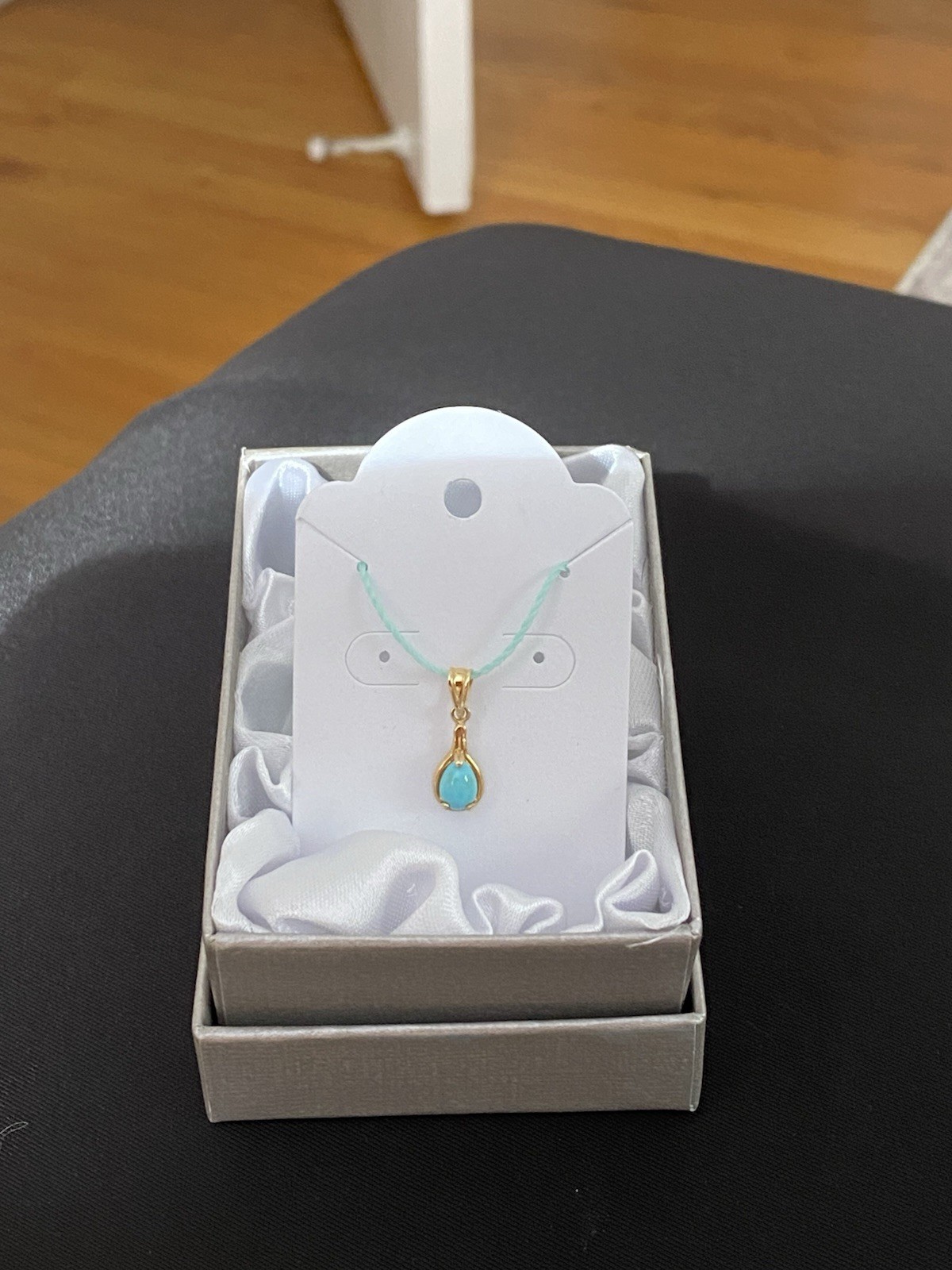Beautiful Turquoise Pendant Set In 14K Yellow Gold On A Blue Cord