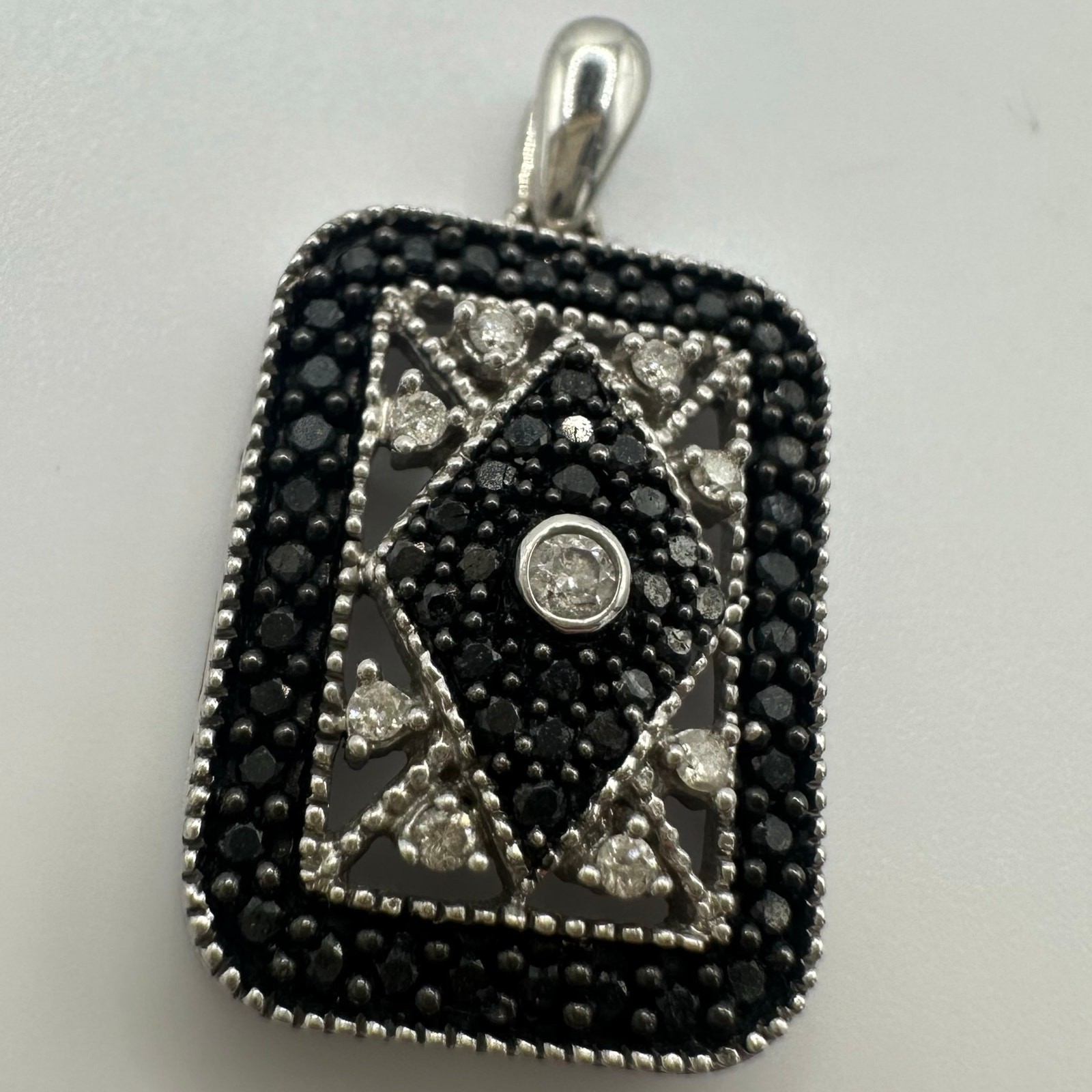 14kt solid white gold white black diamonds treated 0.50CTW pendant 3.13 grams