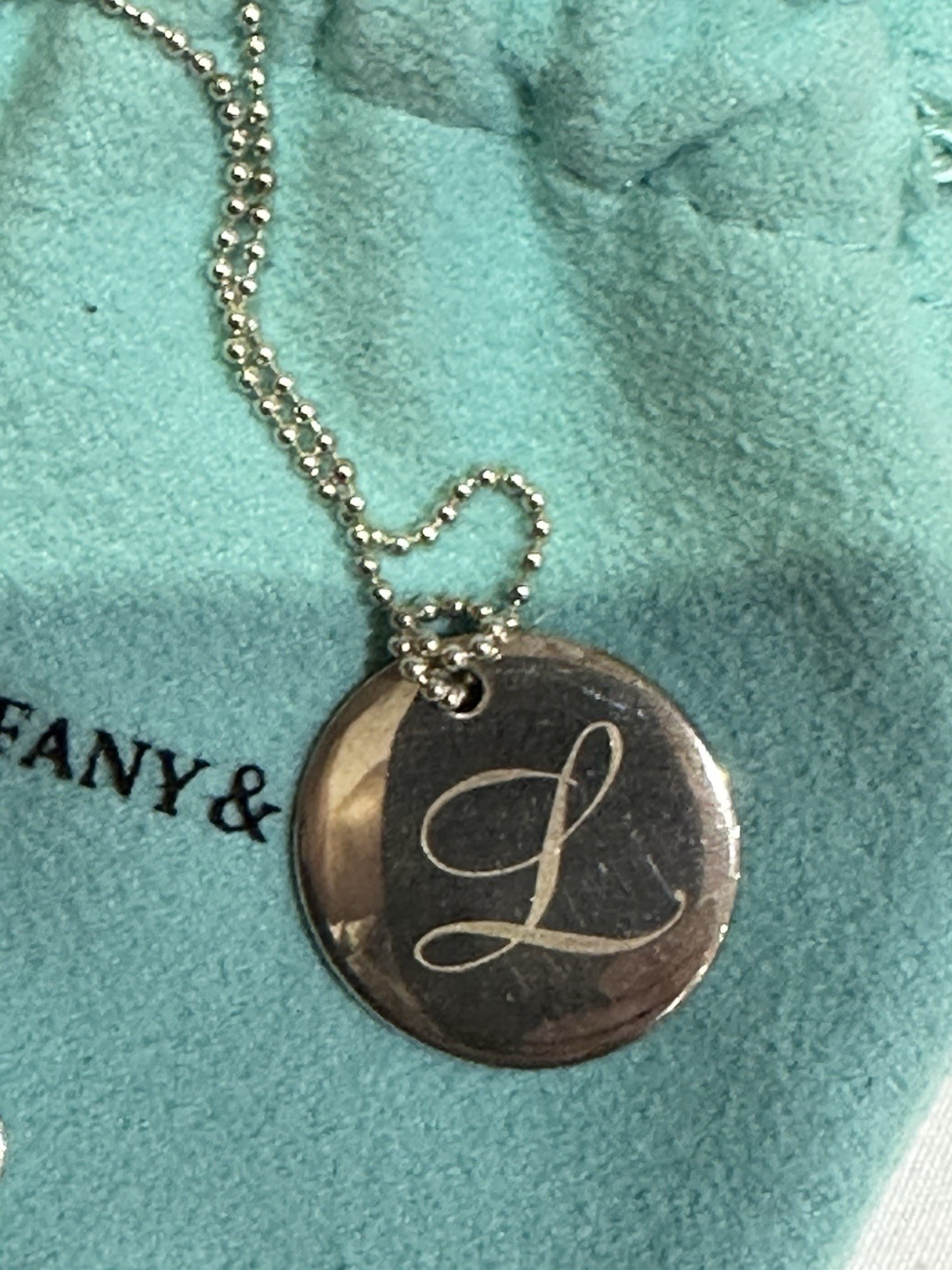 TIFFANY & CO INITIAL “L” DISC NECKLACE WITH BALL CHAIN AND POUCH