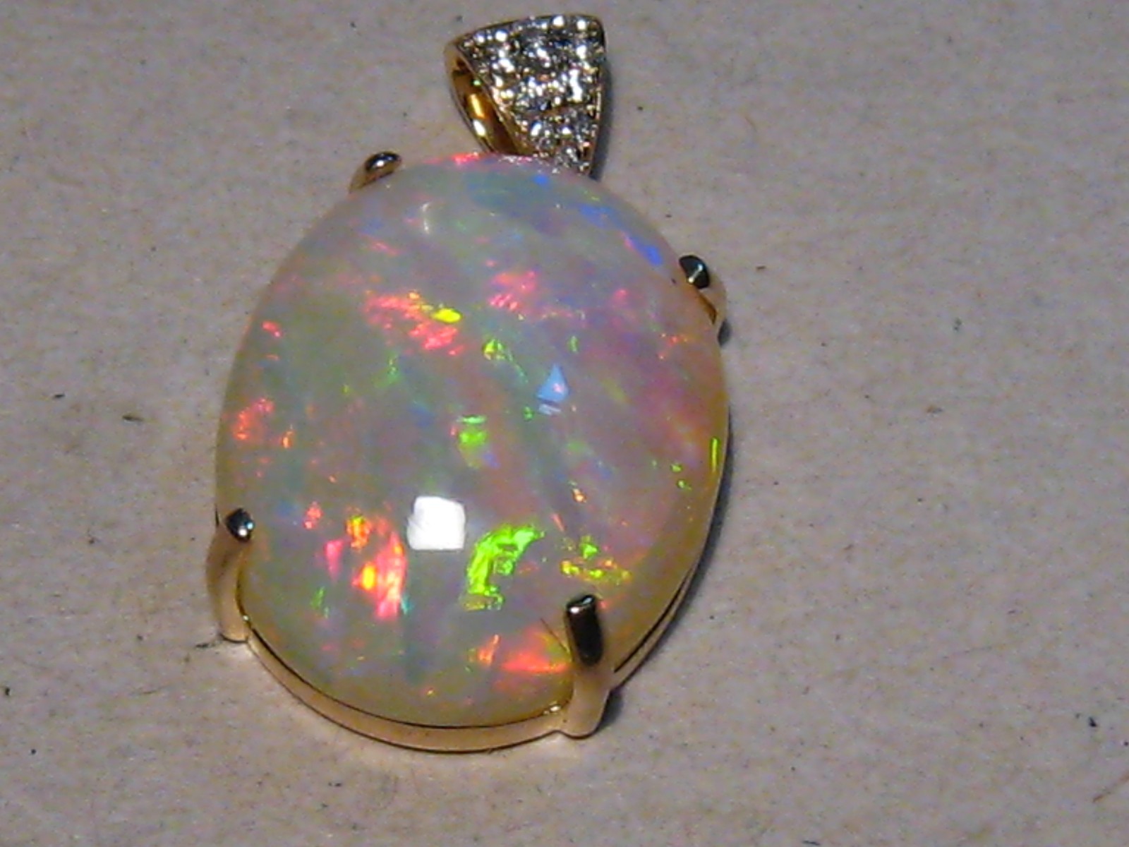 Large 25 ct Welo Opal & Diamond Pendant , Solid 14 k Gold , Brightness 5+