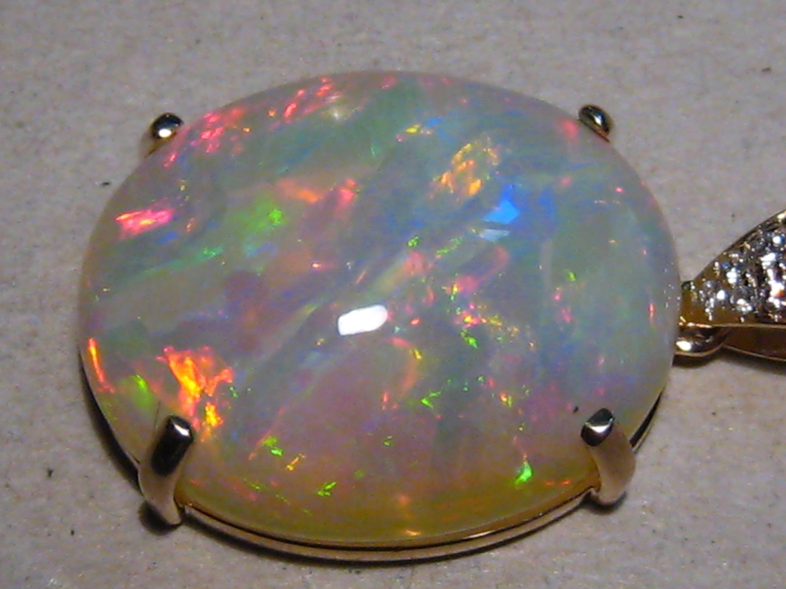 Large 25 ct Welo Opal & Diamond Pendant , Solid 14 k Gold , Brightness 5+