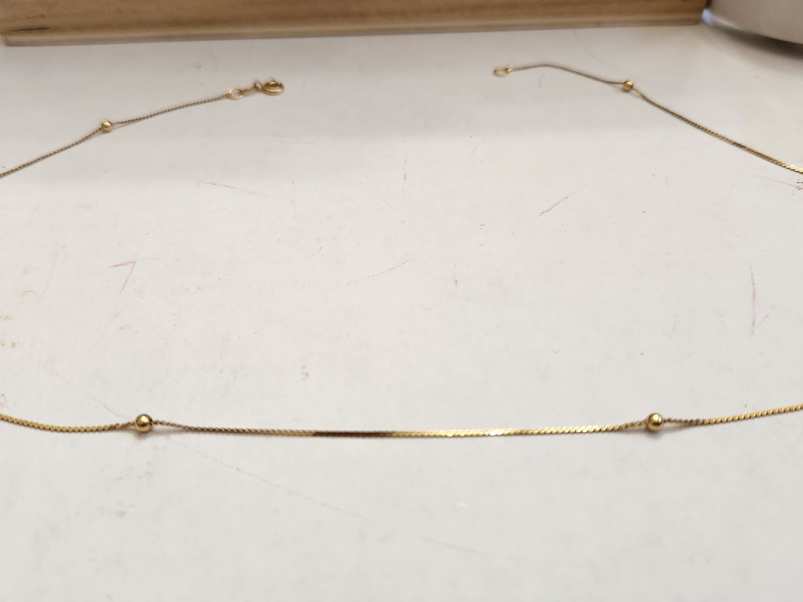 14k Gold Serpentine 17.5″ Thin Chain with 6 Tiny Beads 2 Grams Spring Ring