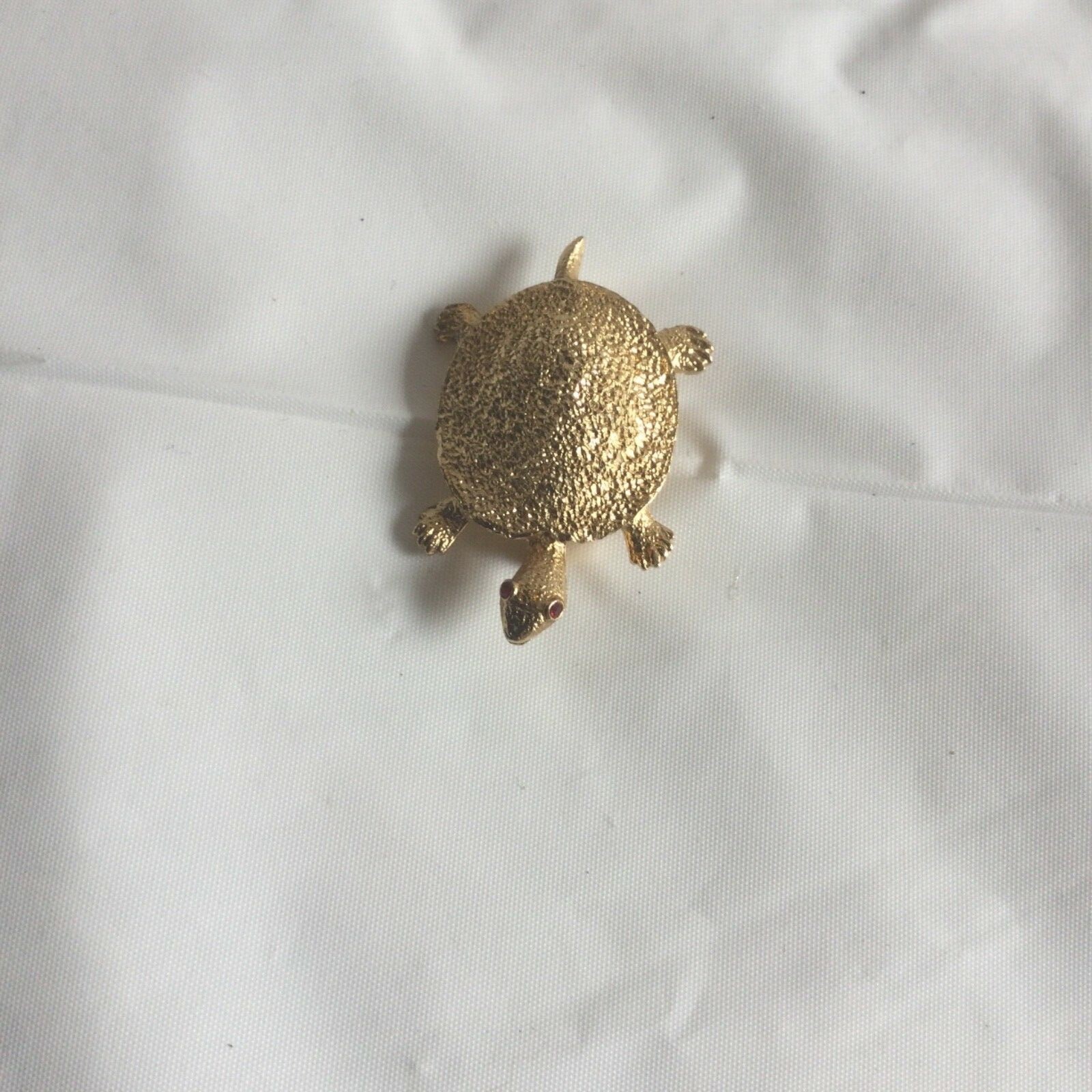 turtle brochure color gold,1.1/2 inches wide preowner,good condition 