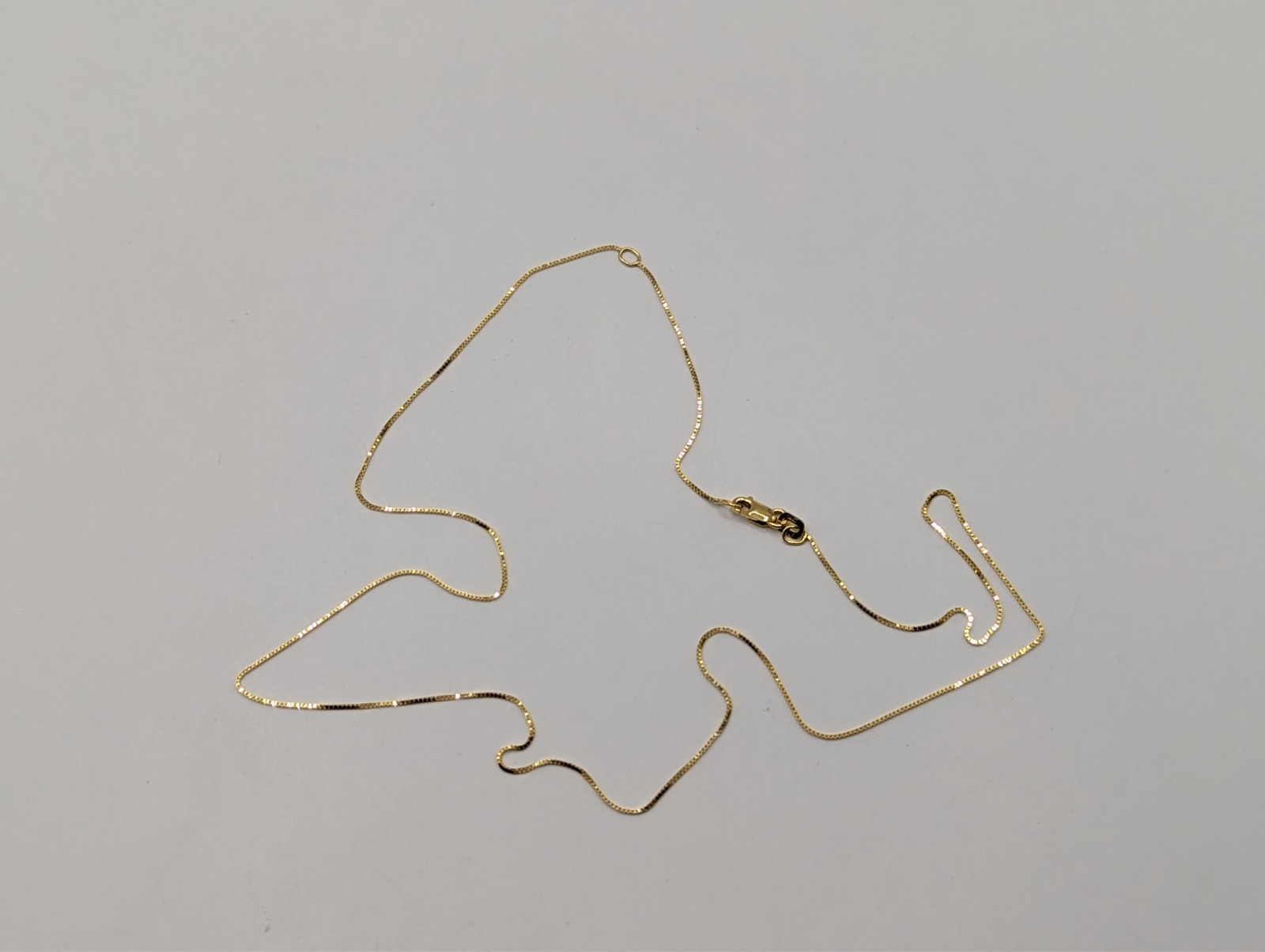 14k Adjustable box chain 16-18″ .6mm with lobster Milor brandclasp