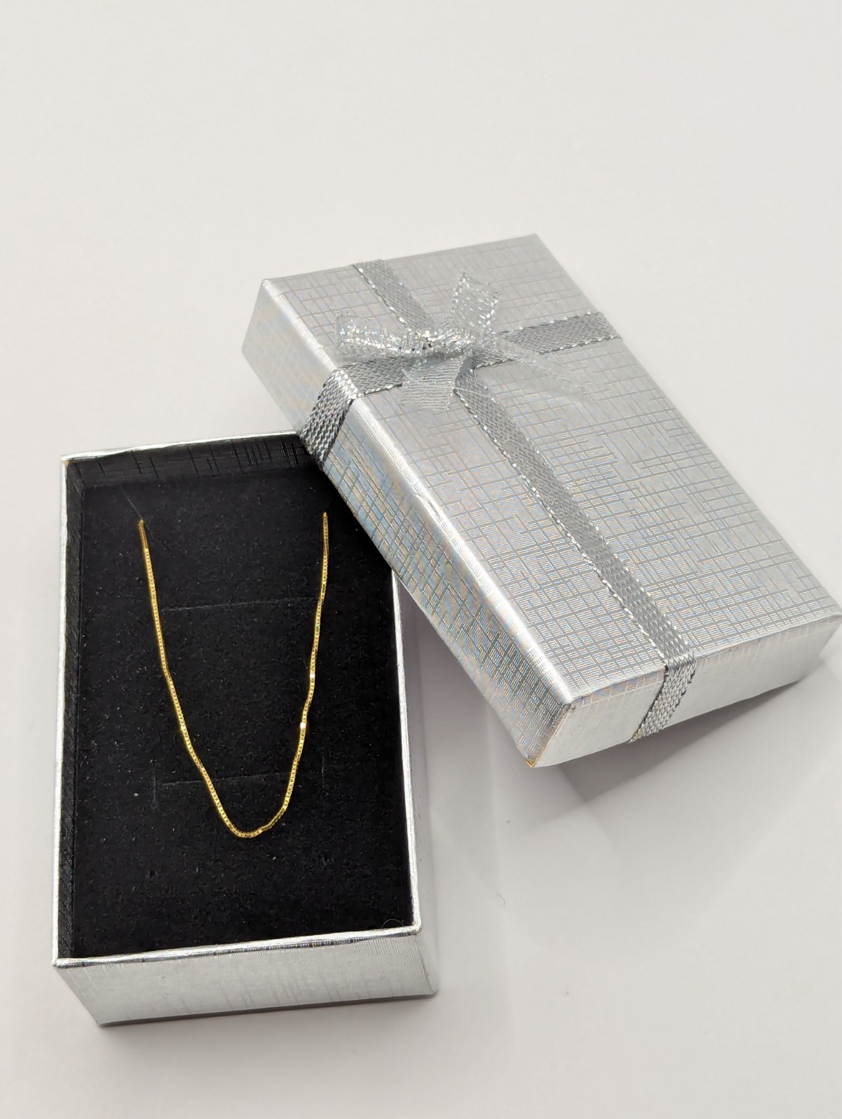14k Adjustable box chain 16-18″ .6mm with lobster Milor brandclasp