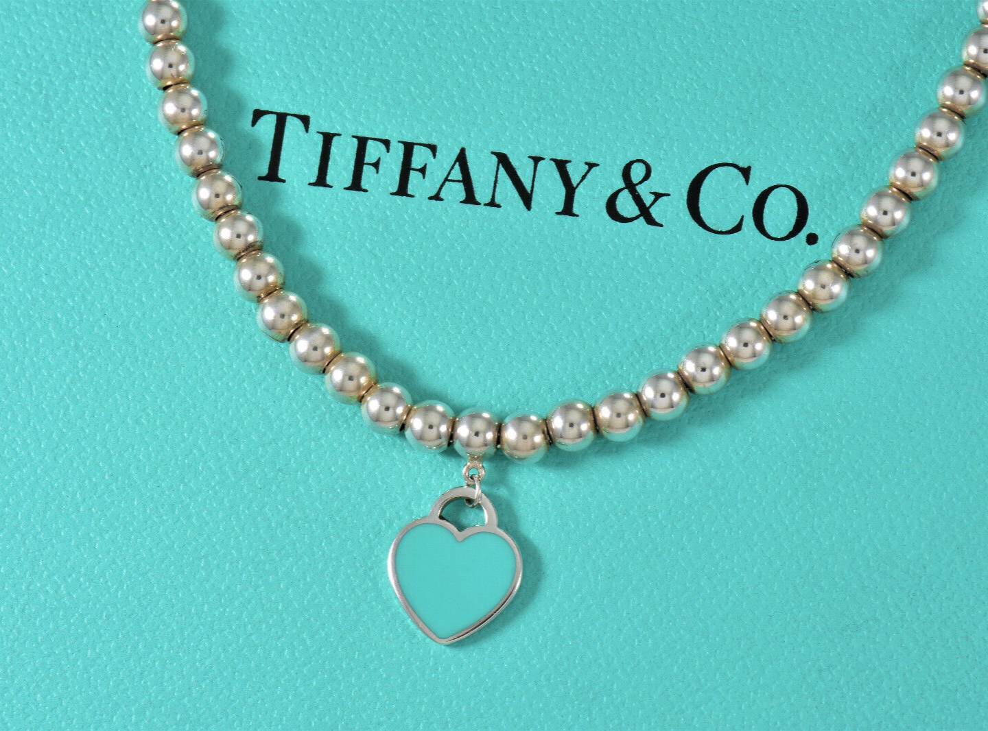 16.25″ Please Return Tiffany & Co Silver Blue Enamel Heart Pendant Bead Necklace
