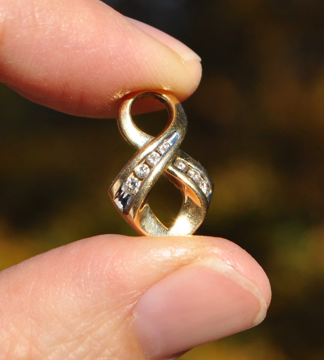 14k Solid Gold Natural Diamond Pendant – Twist Infinity Channel Set Yellow Gold