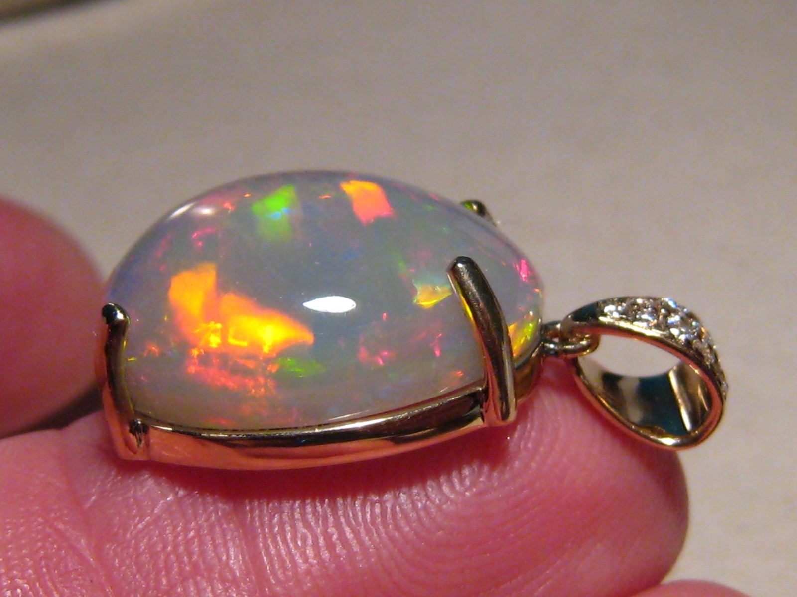 Large 16 ct. Ethiopian Opal and Diamond Pendant , 14 k Gold , Red Harlequin