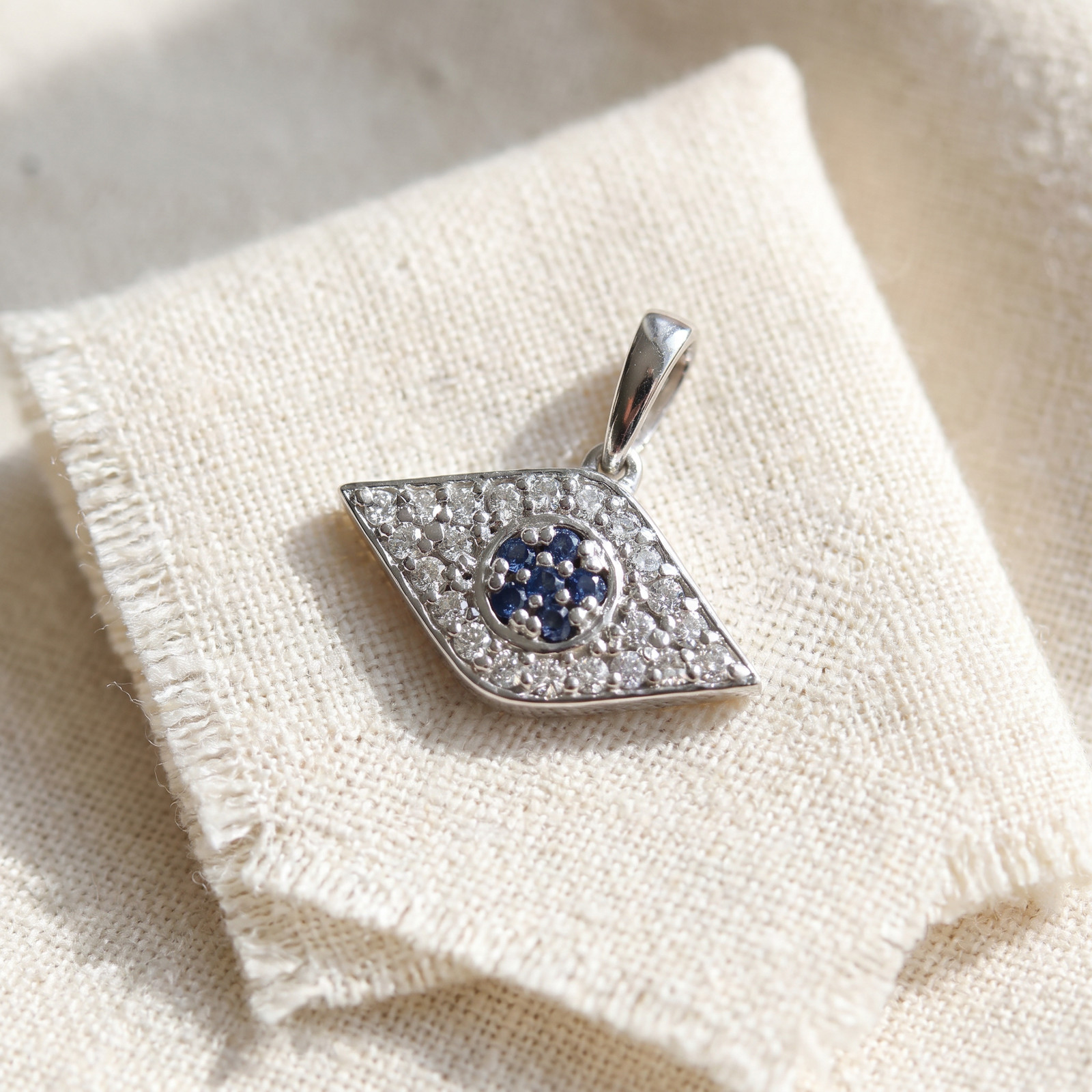 1/4ct Treated Blue & White Diamond Evil Eye Pendant 14K White Gold W/ 18″ Chain