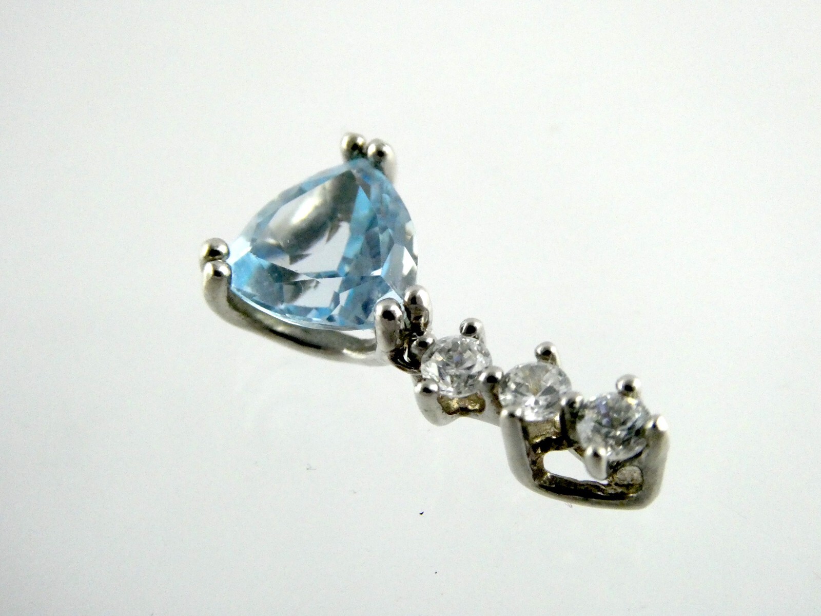Sterling Silver Blue Topaz White CZ Pendant Trillion and Round Cuts 925 .75 Inch