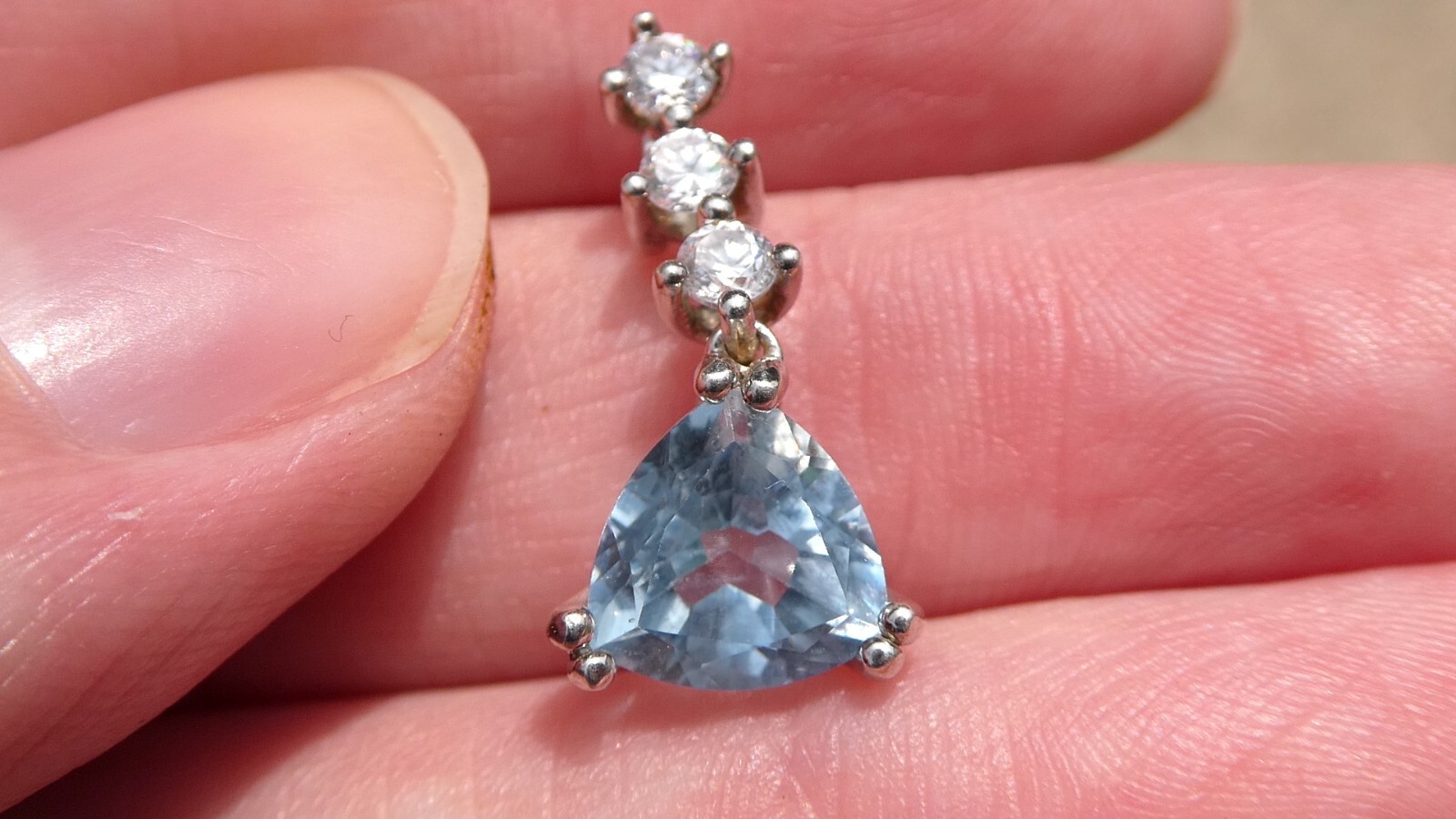Sterling Silver Blue Topaz White CZ Pendant Trillion and Round Cuts 925 .75 Inch