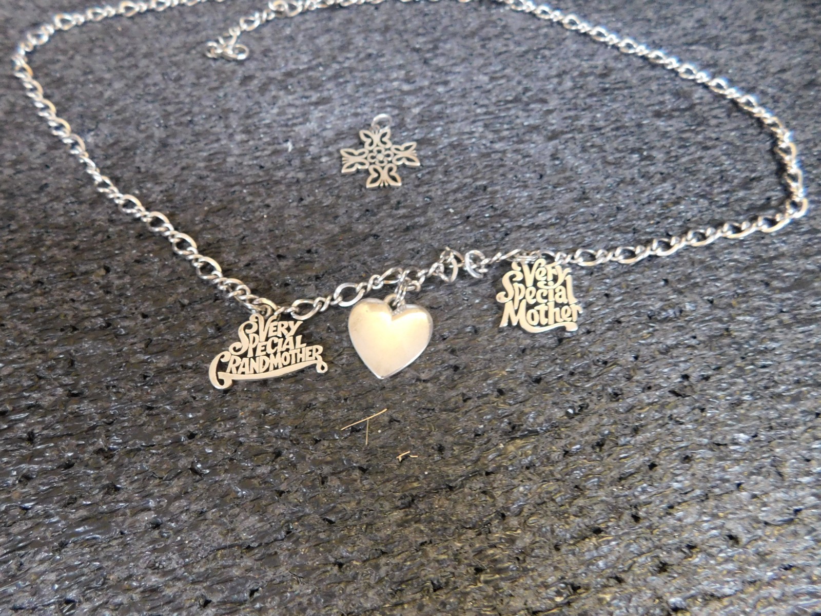 JAMES AVERY 30″ SIVER CHAIN WITH THREE CHARMS ON NECKLACE AND ONE CHARM LOOSE