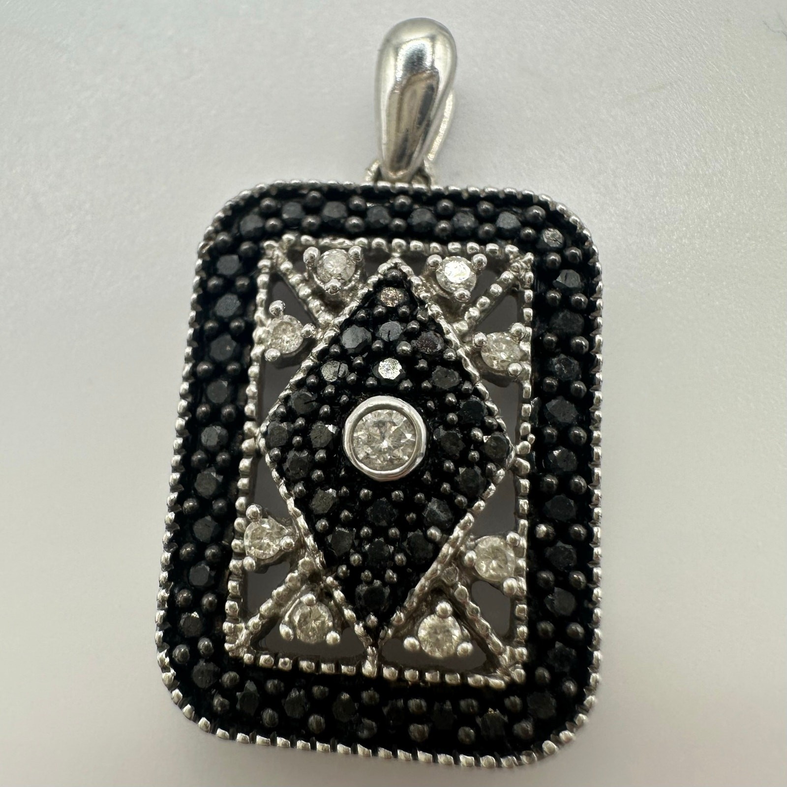 14kt solid white gold white black diamonds treated 0.50CTW pendant 3.13 grams