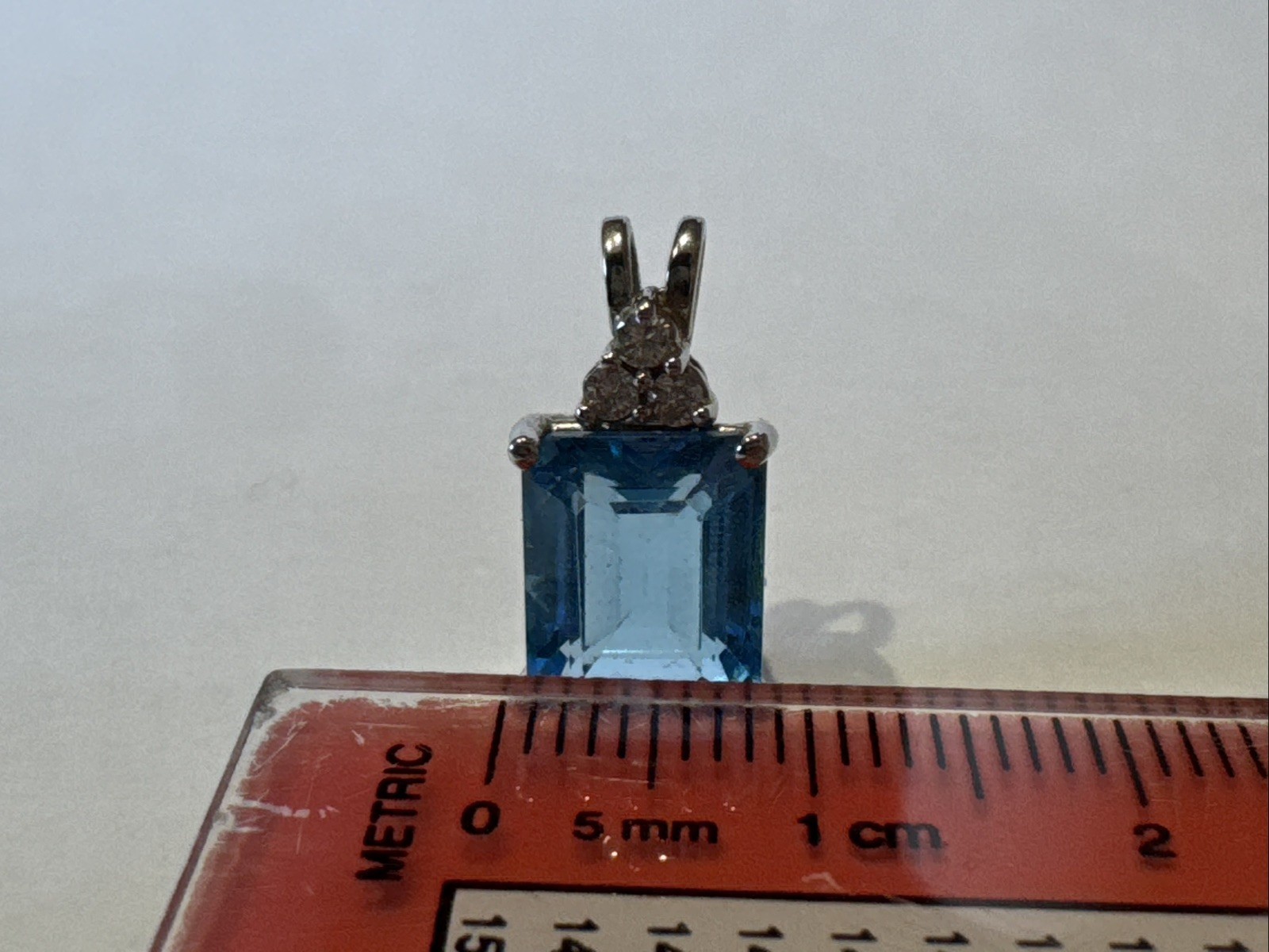 10K White Gold Pendant with Swiss Blue Topaz and White Diamond