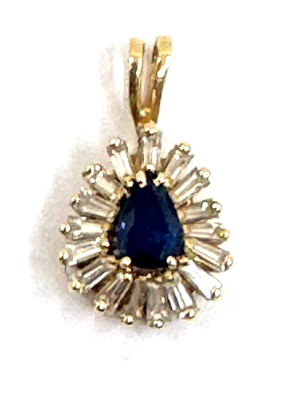 14k gold pear-shape sapphire with a halo of baguette-cut diamond pendant