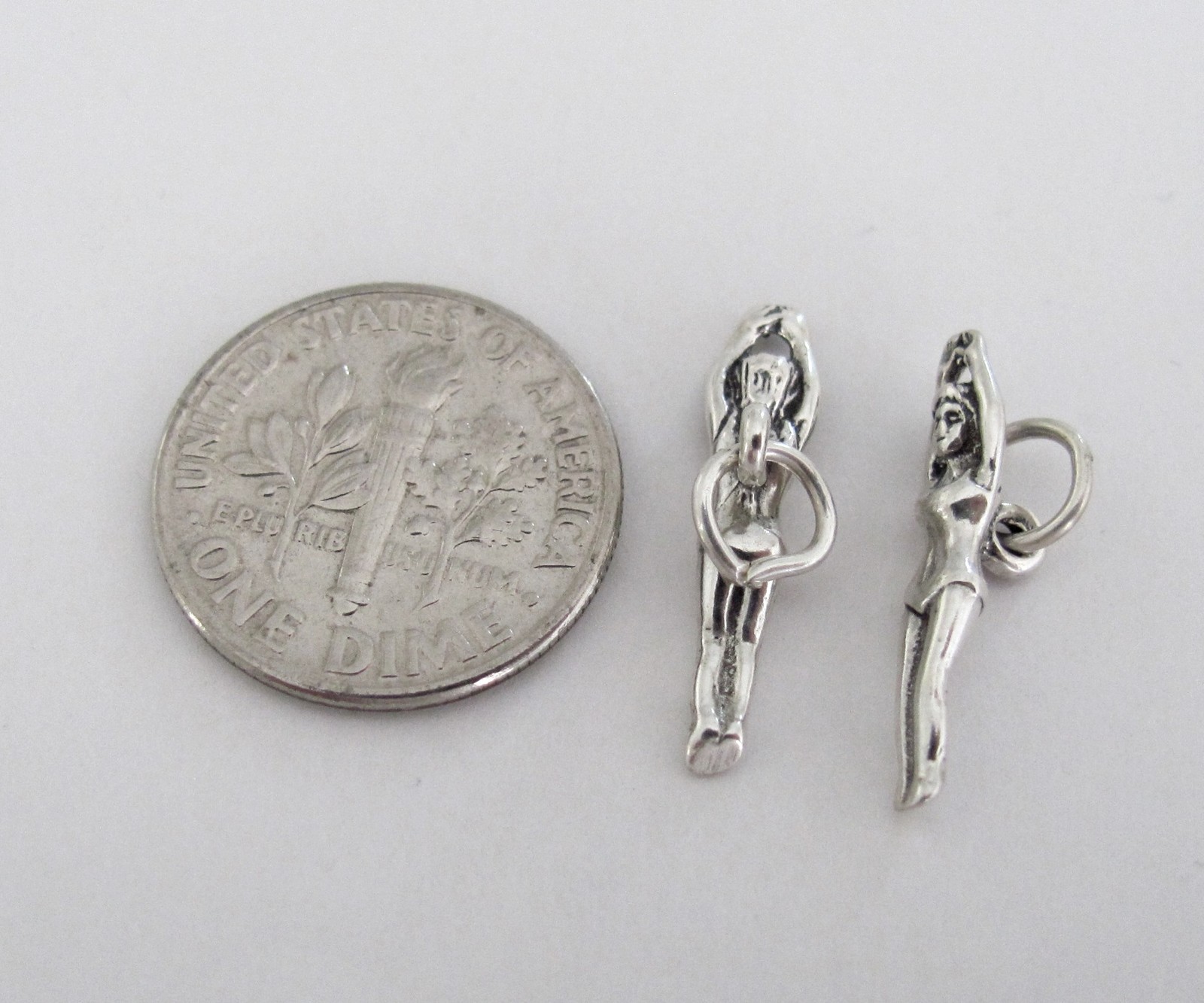 Very small Sterling Silver Female diver swimmer mini tiny charm.