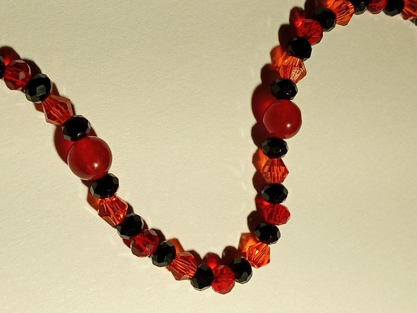 Beautiful Magic Necklace with Red, Black and Orange Crystals