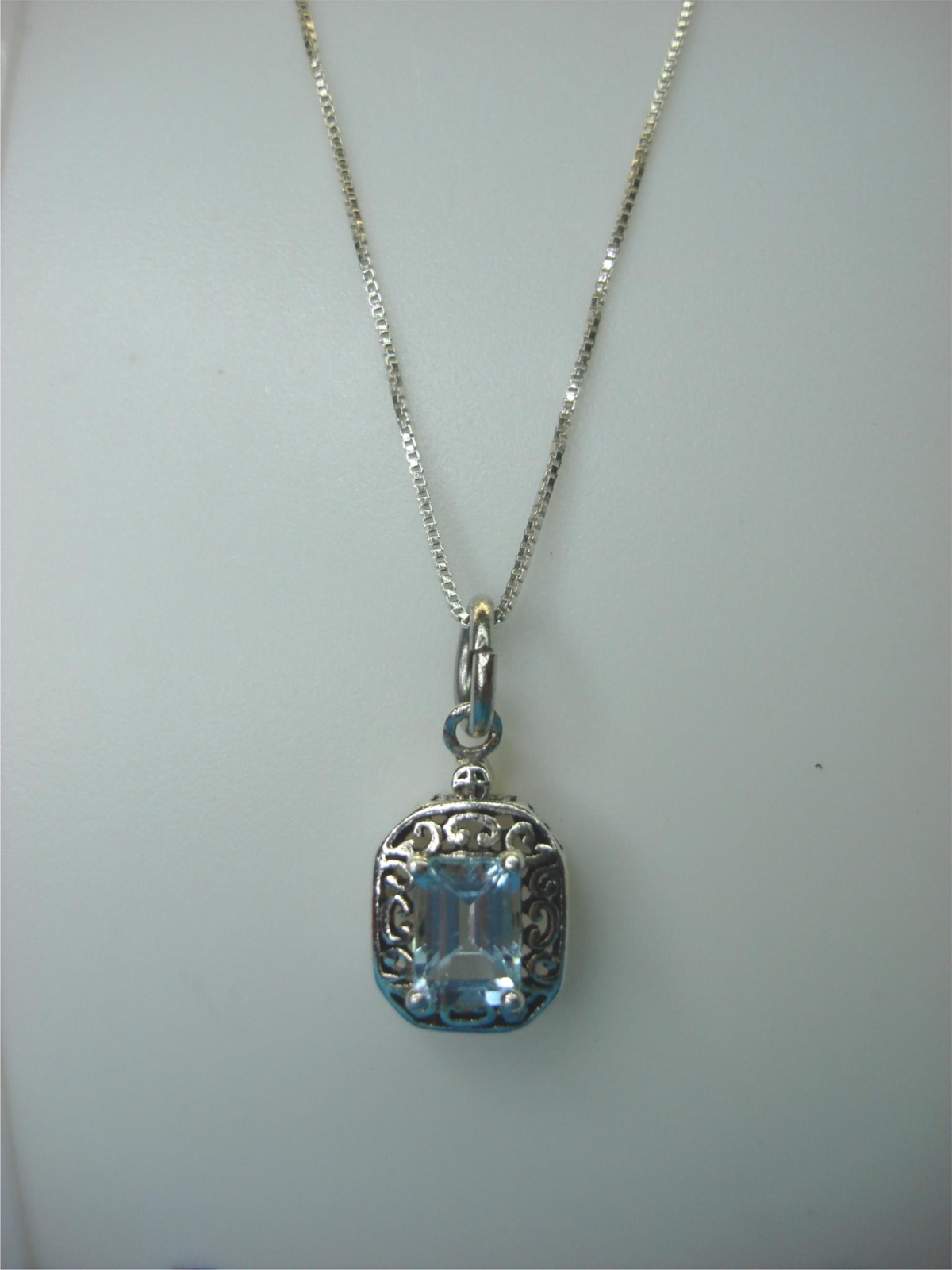 STERLING SILVER FANCY PENDANT WITH LIGHT BLUE STONE & 18″ STER. BOX LINK CHAIN