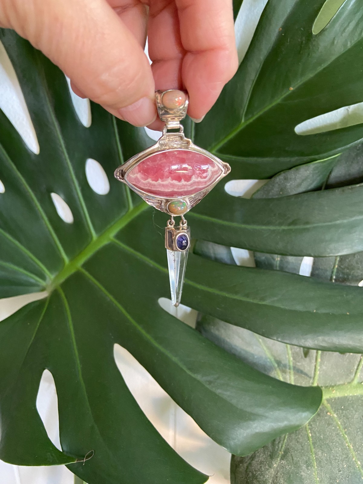 Rhodochrosite Pendant with Inlaid Opal Bail and Quartz Point w/ Inlaid Amethyst