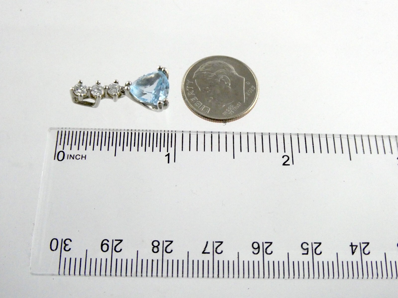 Sterling Silver Blue Topaz White CZ Pendant Trillion and Round Cuts 925 .75 Inch