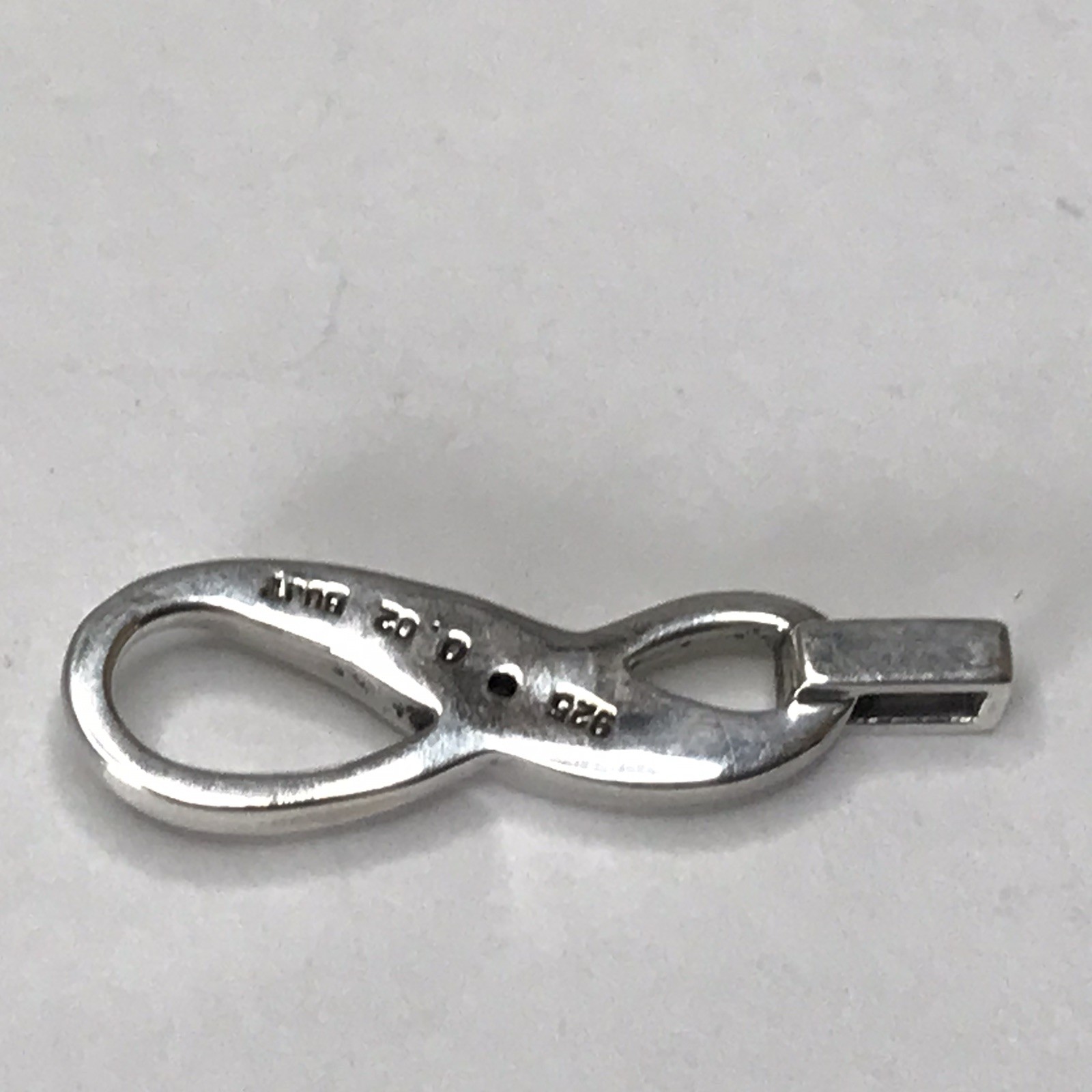 Sterling silver diamond infinity pendant 2.07grams