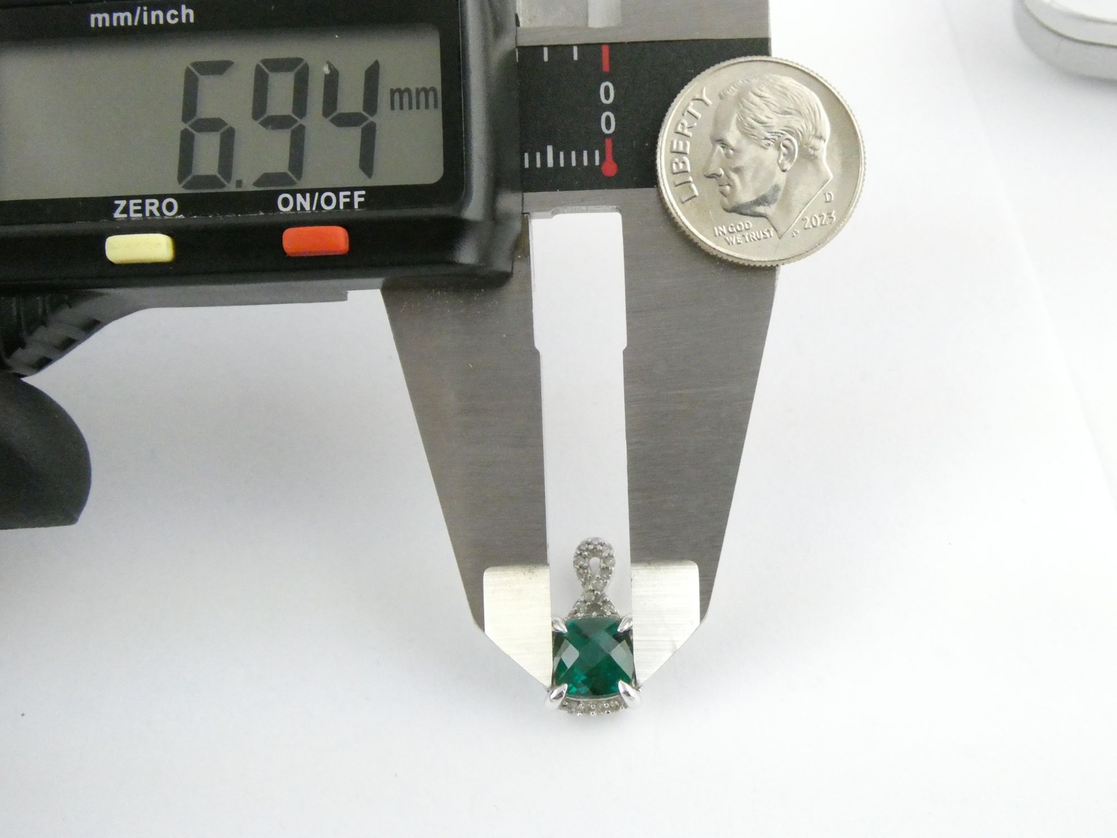 SR Designer Sterling Silver Lab Created Emerald and Diamond Pendant 1.4g 5/8 In