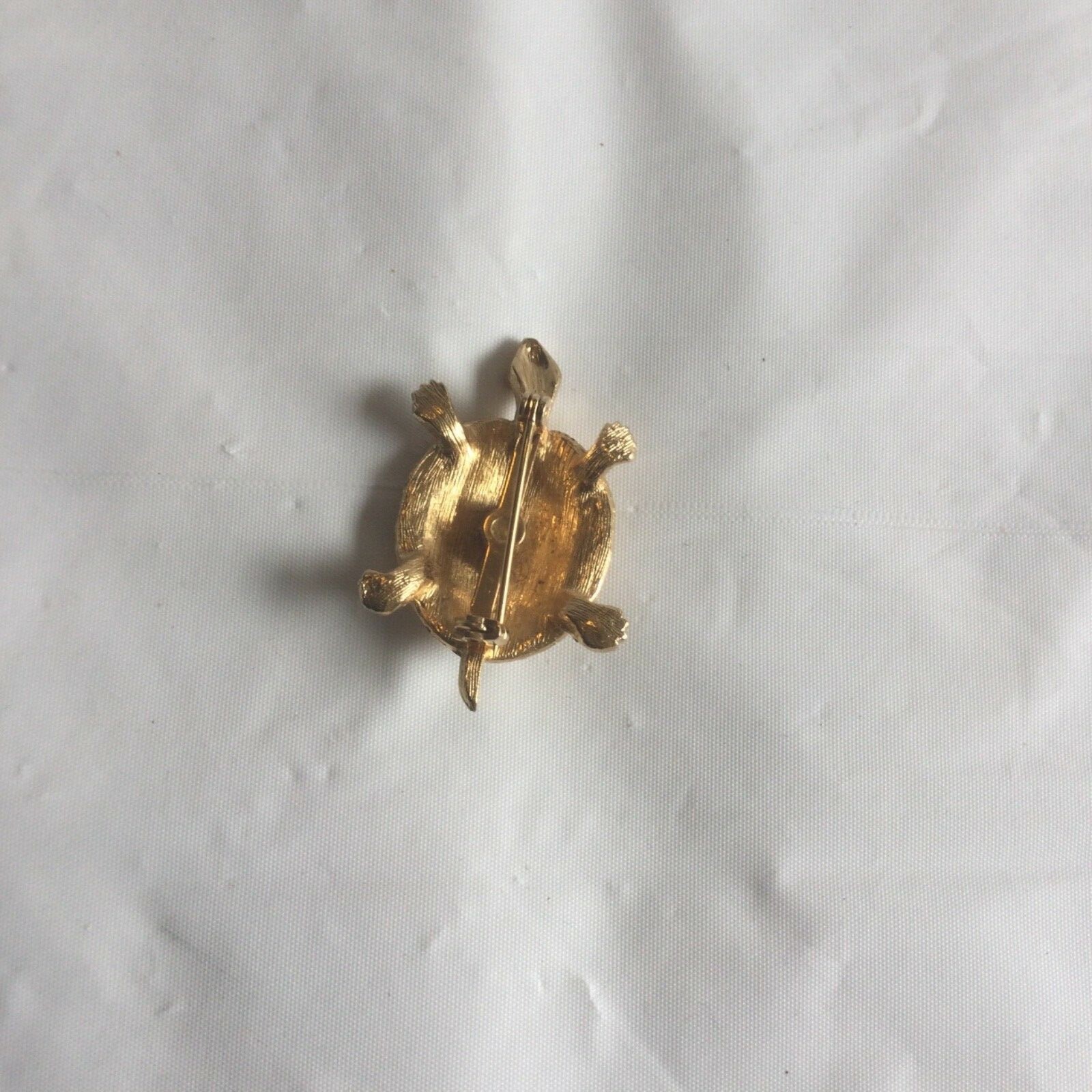 turtle brochure color gold,1.1/2 inches wide preowner,good condition 