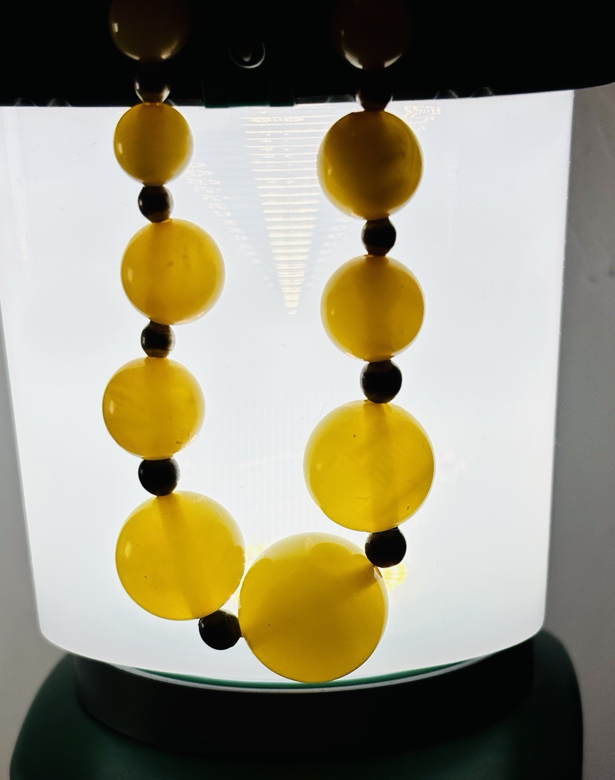 AMBER ?/BAKELITE?/WITH BOX/STERLING SPACERS/IN BOX/VINTAGE/6”Diameter/8”DRP. EUC