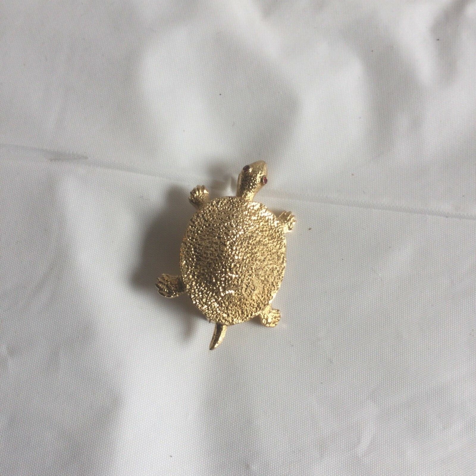turtle brochure color gold,1.1/2 inches wide preowner,good condition 